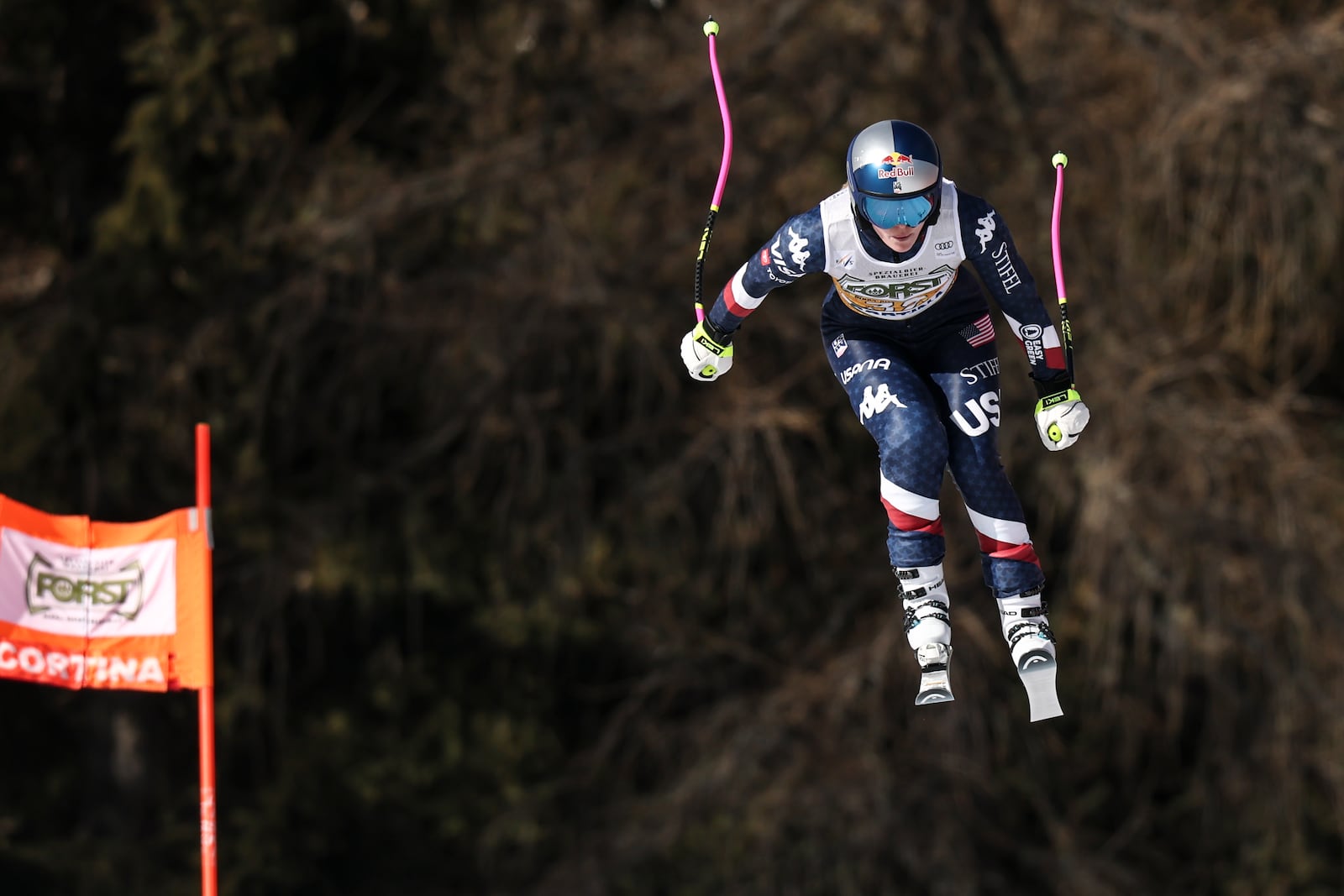 United States' Lindsey Vonn speeds down the course during an alpine ski, women's World Cup downhill training, in Cortina d'Ampezzo, Italy, Thursday, Jan. 16, 2025. (AP Photo/Marco Trovati)