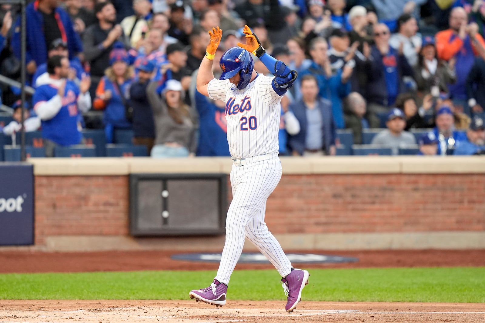 New York Mets' Pete Alonso celebrates a three-run home run against the Los Angeles Dodgers during the first inning in Game 5 of a baseball NL Championship Series, Friday, Oct. 18, 2024, in New York. (AP Photo/Frank Franklin II)