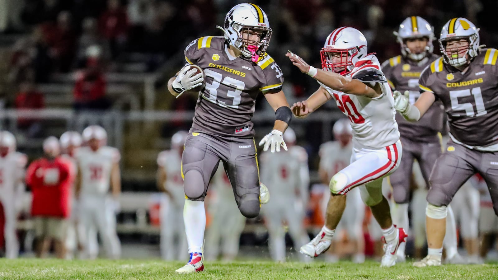 Kenton Ridge High School senior Jackson Patton runs the ball during their game on Friday night at Richard L. Phillips Field in Springfield. The Red Raiders won 42-7. CONTRIBUTED PHOTO BY MICHAEL COOPER