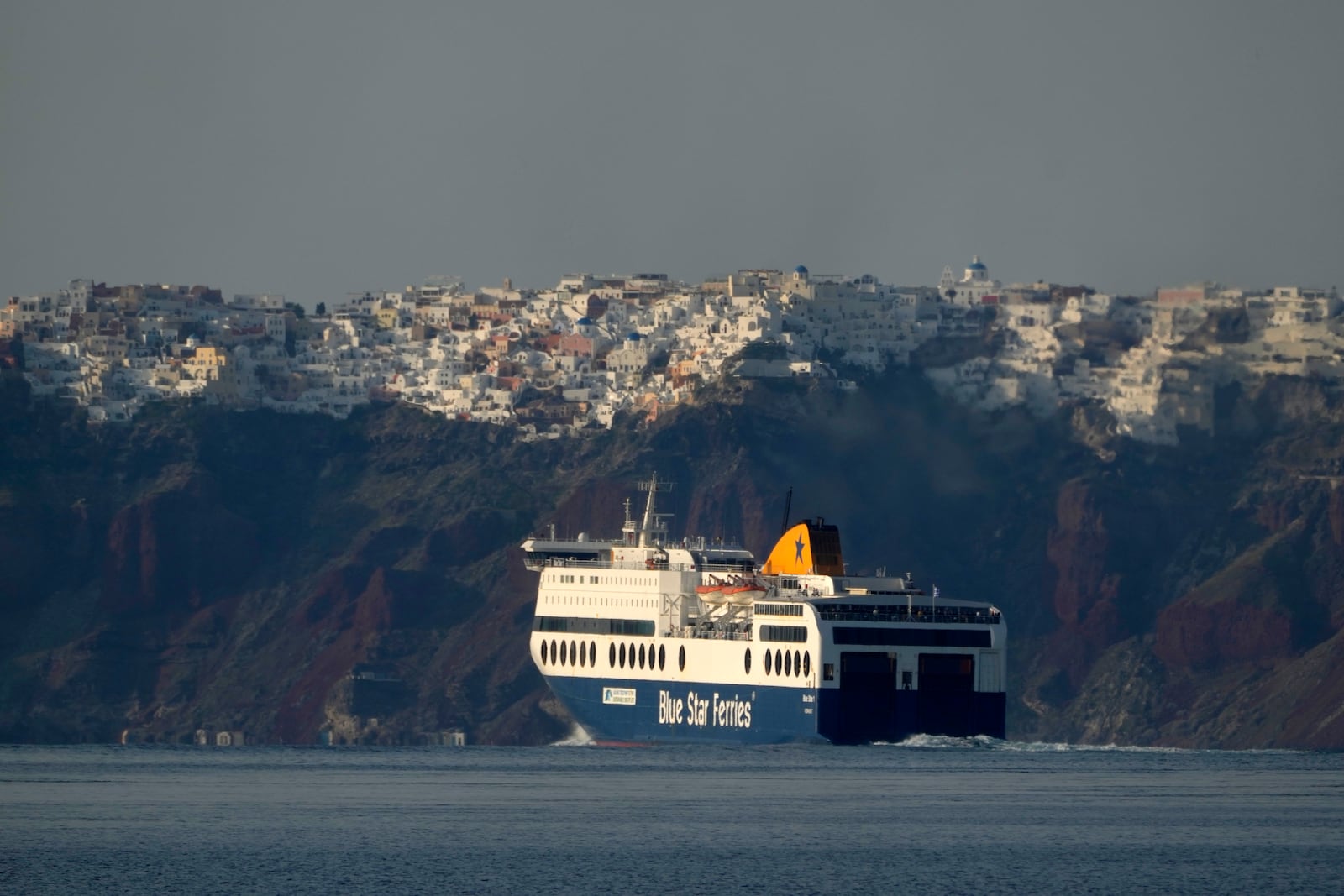 A regularly scheduled ferry departs from Santorini to Athens' port of Piraeus, after a spike in seismic activity raised concerns about a potentially powerful earthquake in Santorini, southern Greece, Monday, Feb. 3, 2025. (AP Photo/Petros Giannakouris)