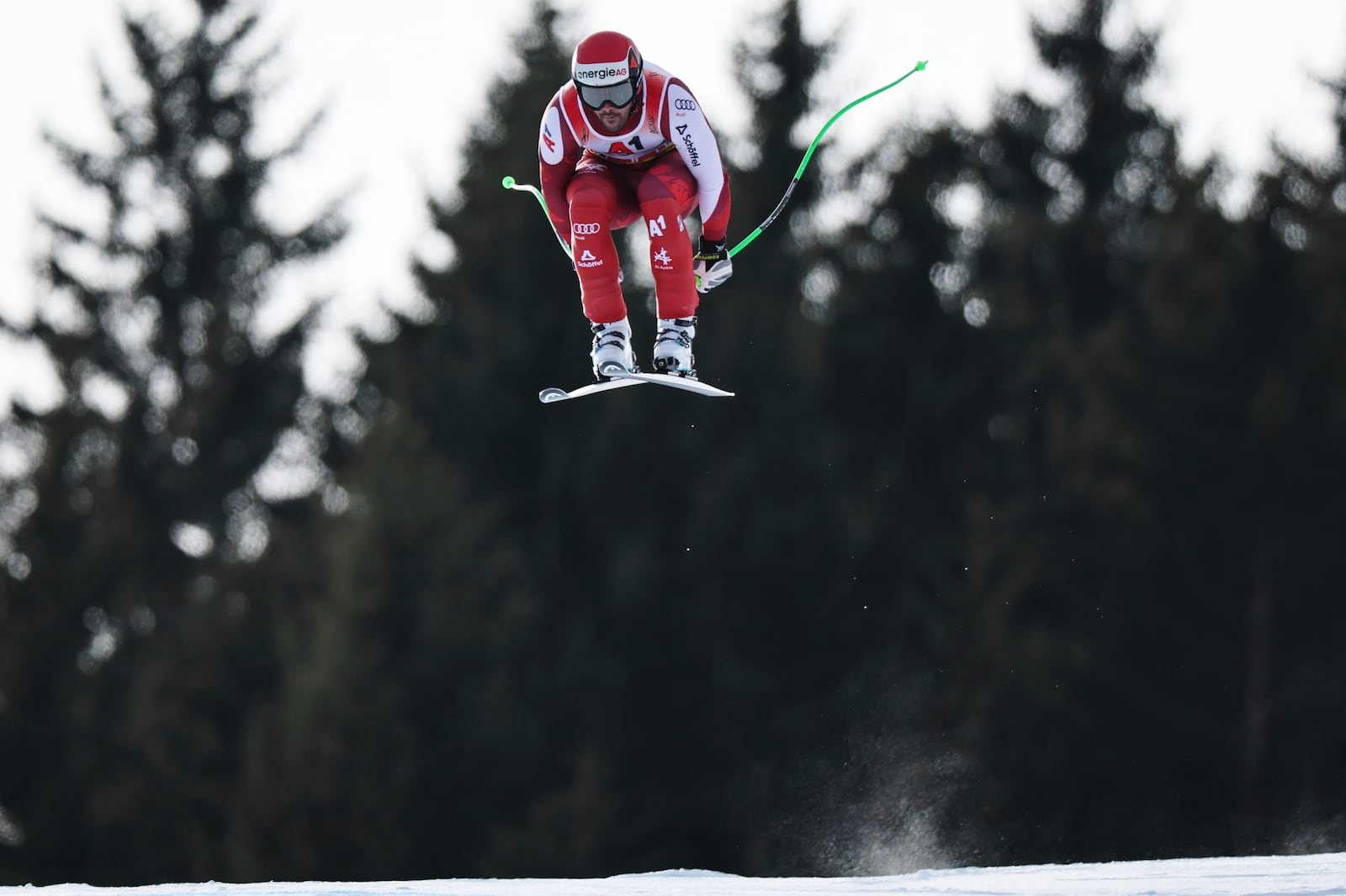 Austria's Vincent Kriechmayr speeds down the course during a men's downhill race, at the Alpine Ski World Championships, in Saalbach-Hinterglemm, Austria, Sunday, Feb. 9, 2025. (AP Photo/Marco Trovati)