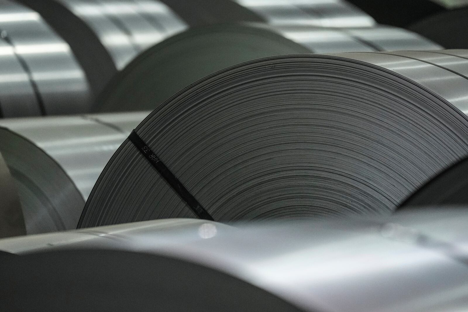 Coils of steel are seen at the ArcelorMittal Dofasco Steel Plant in Hamilton, on Friday, Feb. 14, 2025 (Chris Young/The Canadian Press via AP)