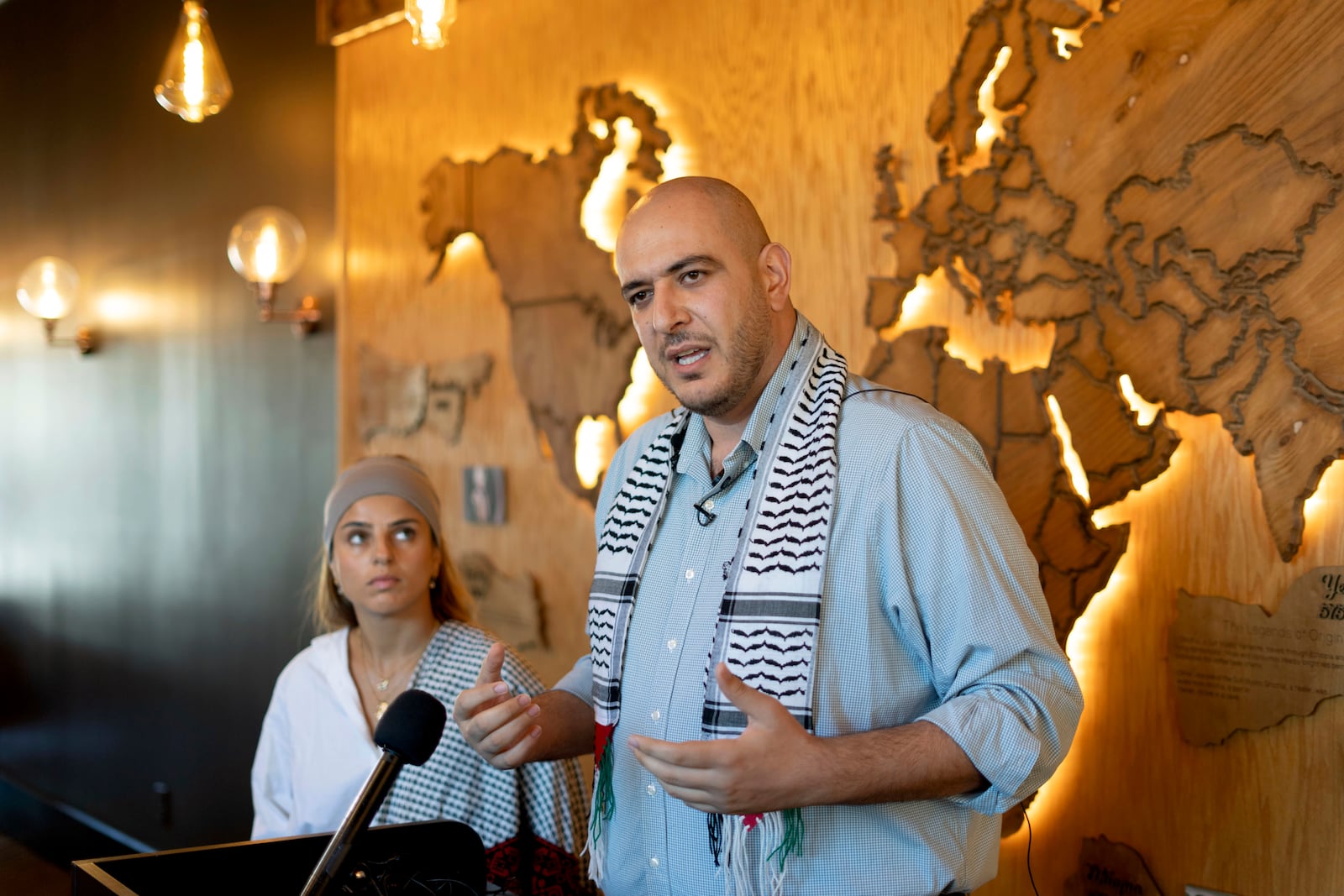 Uncommitted National Movement organizers Abbas Alawieh, right, and Lexis Zeidan, speak to the media about President-elect Donald Trump's victory Wednesday, Nov. 6, 2024, in Dearborn, Mich. (AP Photo/David Goldman)