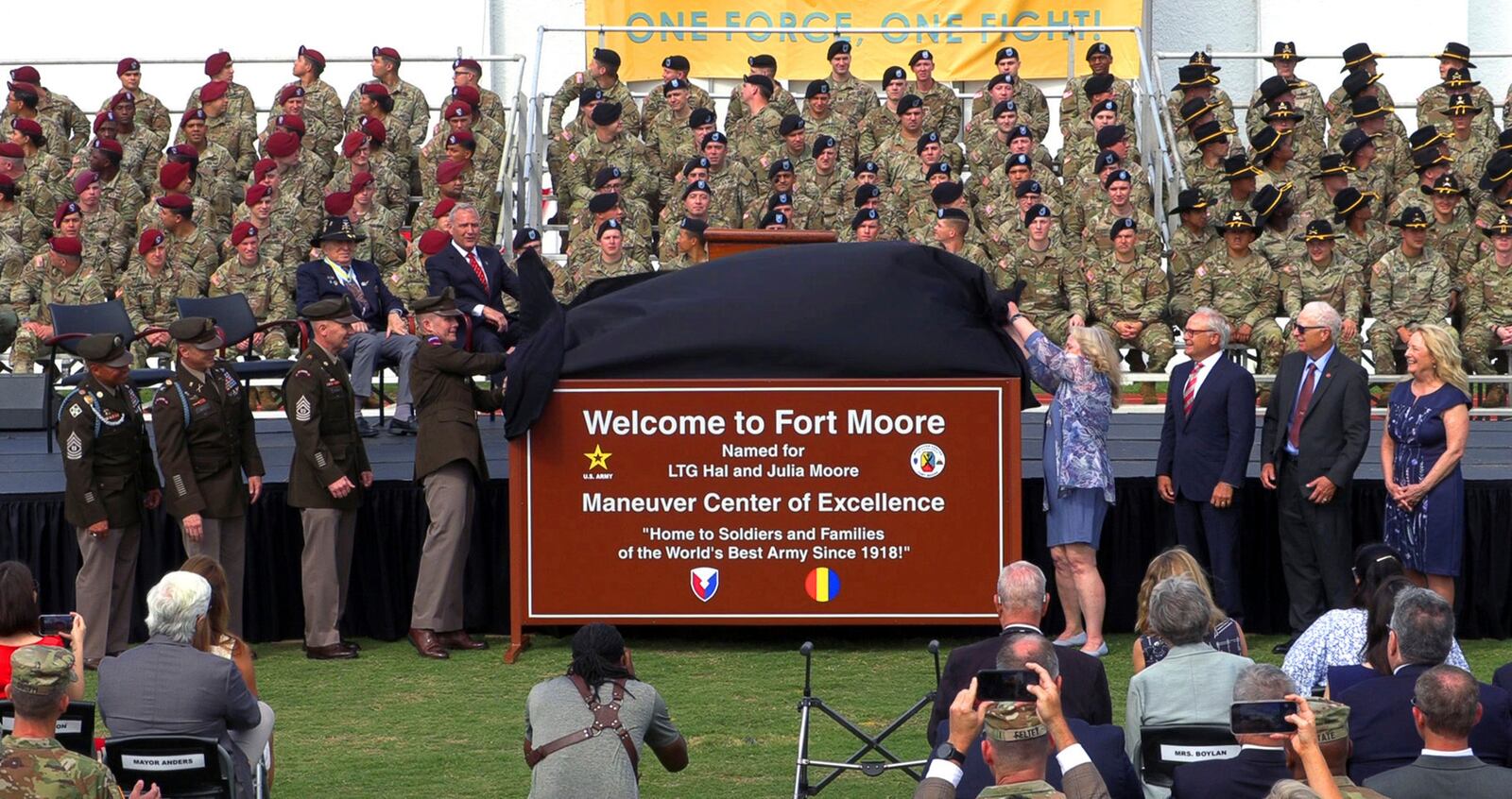 FILE - The children of Lt. Gen. Hal and Julia Moore join the command team at what's now Fort Moore during the unveiling the new sign, May 11, 2023, in Fort Moore, Ga. (Mike Haskey/Ledger-Enquirer via AP, File)