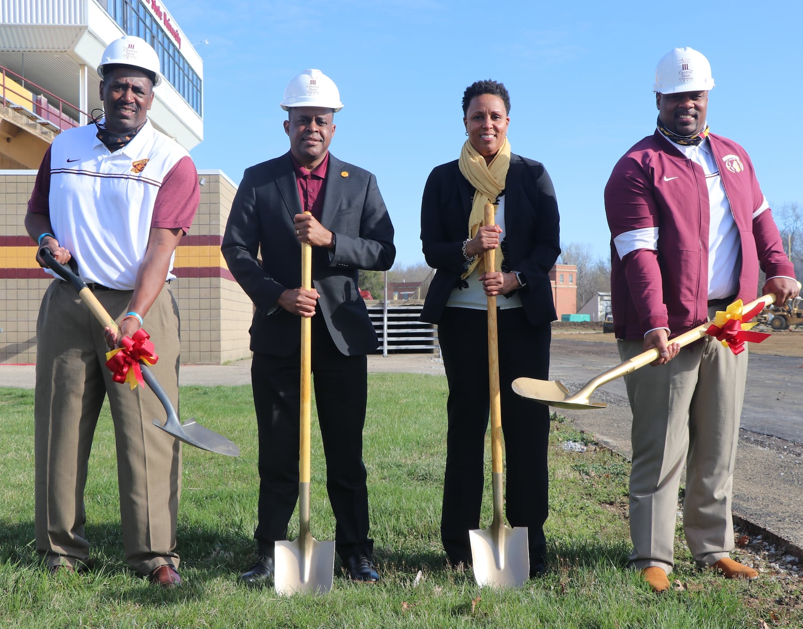 Head track voach Elliot Lightfoot, CSU President Jack Thomas. CSU Athletic Director Tara Owens, head football coach Bobby Rome at the March groundbreaking for the new football field and running track at Central State's McPherson Stadium. Nick Novy/Central State