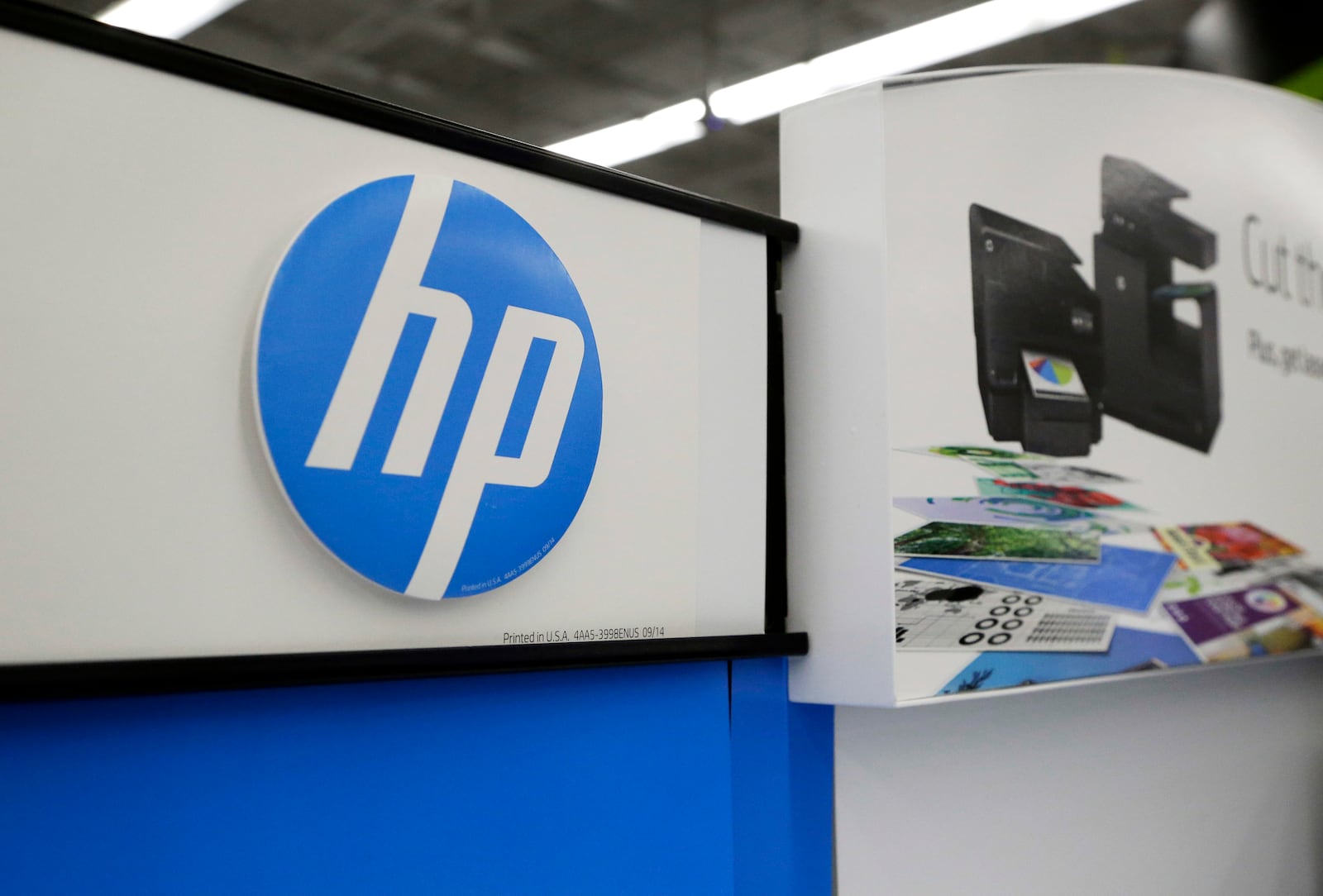 FILE - In this Tuesday, May 24, 2016, photo, Hewlett-Packard products are on display at a store in North Andover, Mass. (AP Photo/Elise Amendola, File)