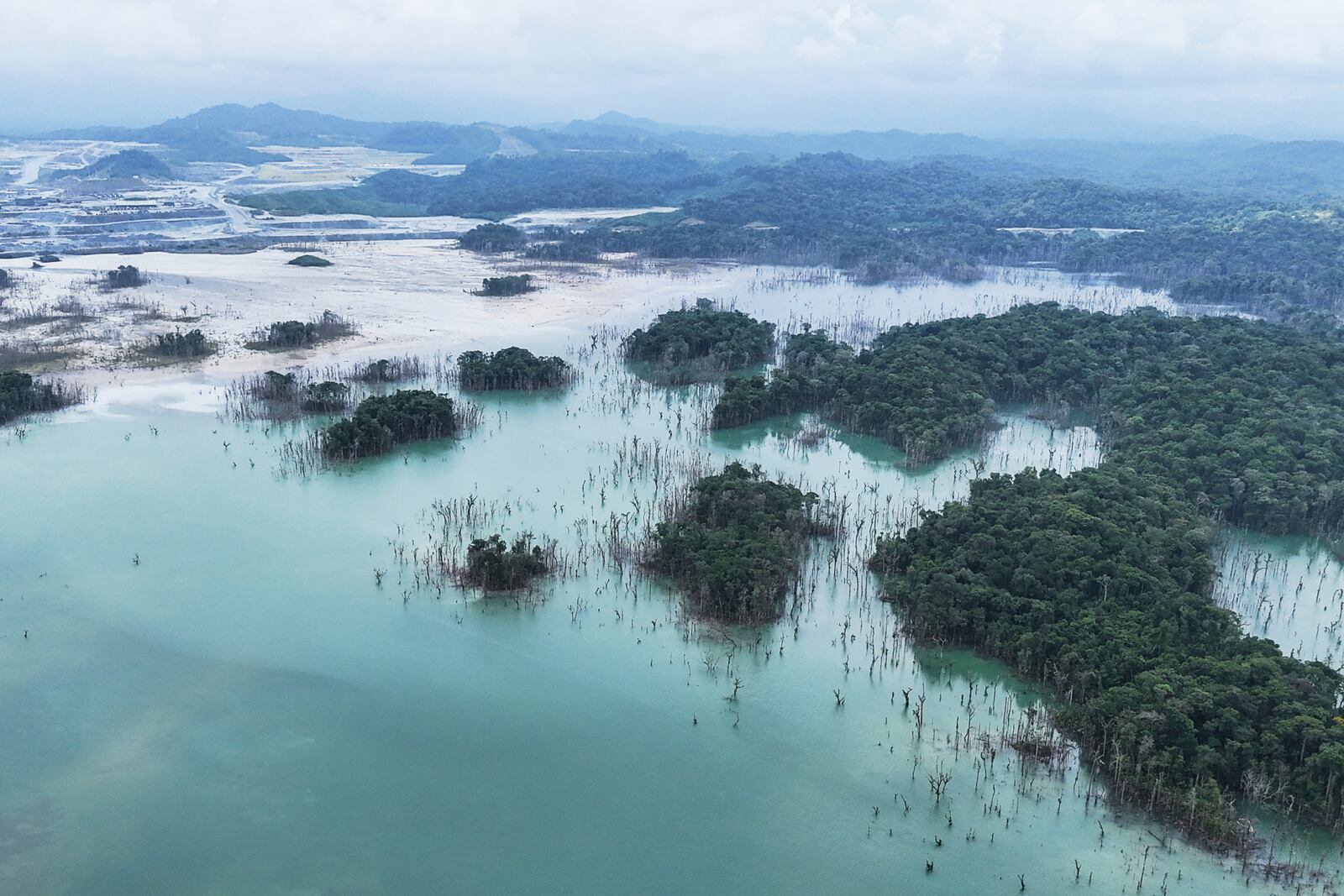 A view of the tailing management ponds in the Cobre Panama copper mine, owned by Canada's First Quantum Minerals, in Donoso, Panama, Friday, March 21, 2025, during a media tour of the mine that was closed after Panama's Supreme Court ruled that the government concession was unconstitutional. (AP Photo/Matias Delacroix)