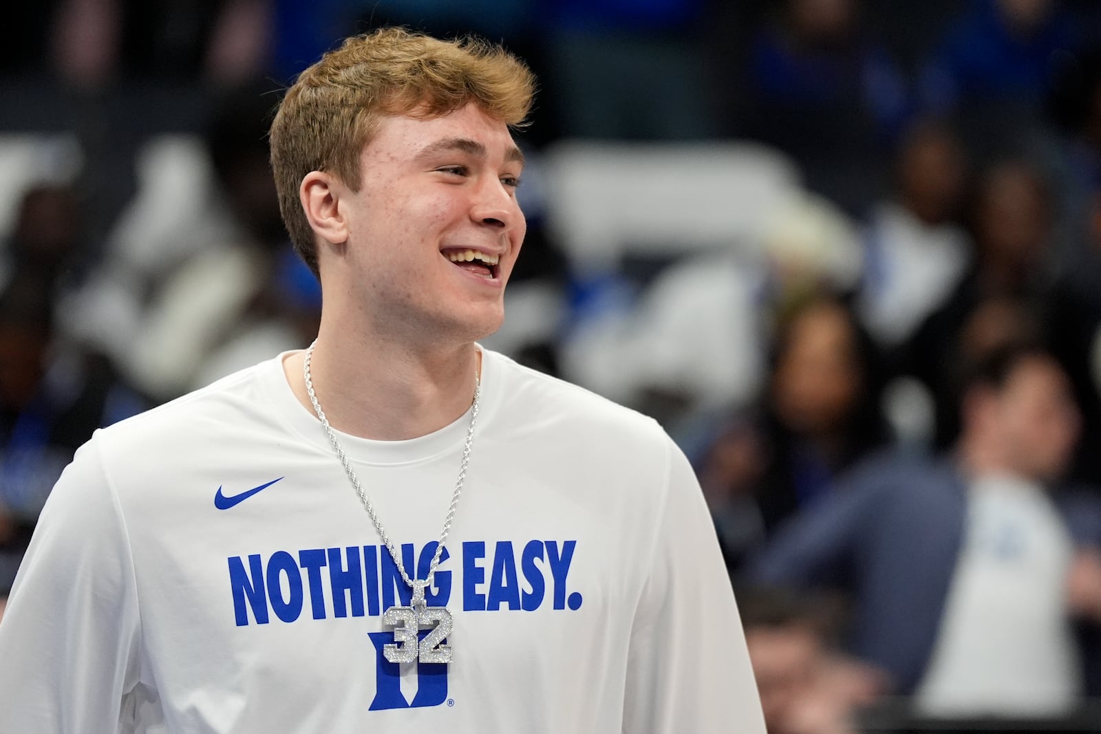 Duke forward Cooper Flagg smiles before an NCAA college basketball game against Louisville in the championship of the Atlantic Coast Conference tournament, Saturday, March 15, 2025, in Charlotte, N.C. (AP Photo/Chris Carlson)