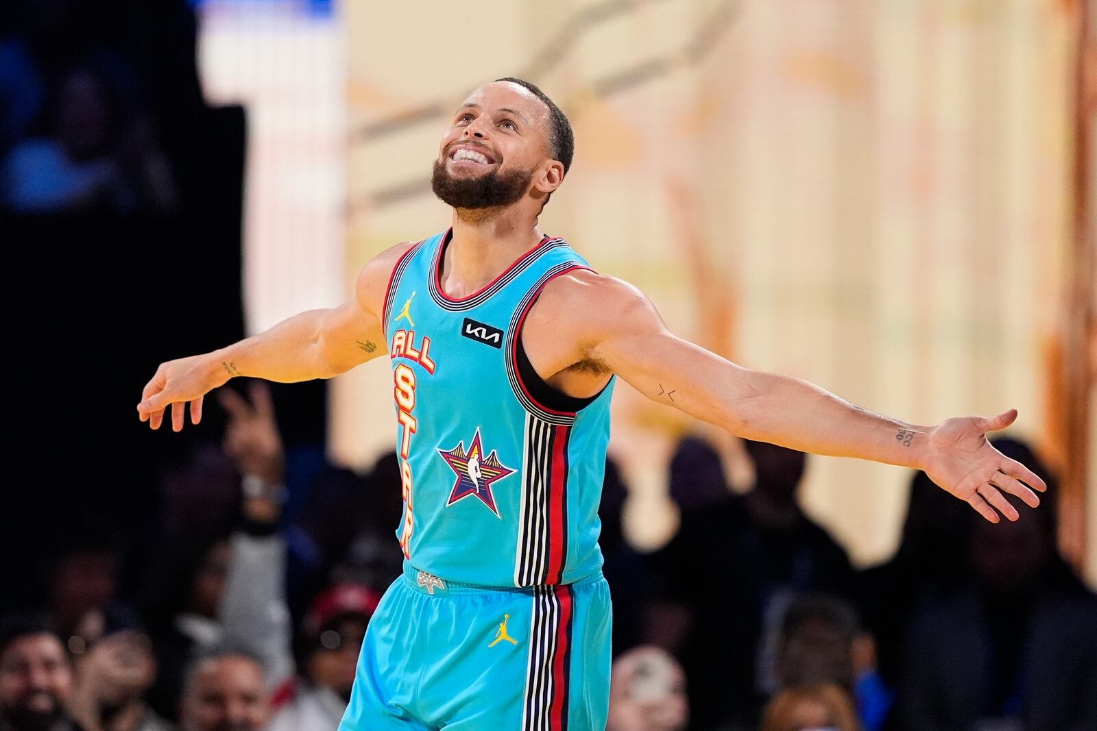 Golden State Warriors guard Stephen Curry celebrates after scoring during the NBA All-Star basketball game Sunday, Feb. 16, 2025, in San Francisco. (AP Photo/Godofredo A. Vásquez)