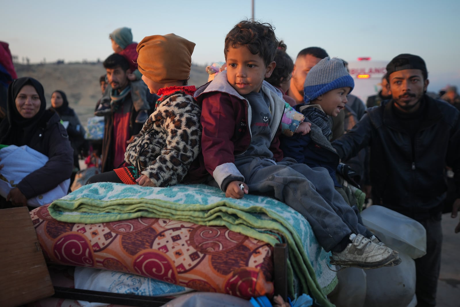 Displaced Palestinians return to their homes in the northern Gaza Strip, following Israel's decision to allow thousands of them to go back for the first time since the early weeks of the 15-month war with Hamas, Monday, Jan. 27, 2025. (AP Photo/Abdel Kareem Hana)