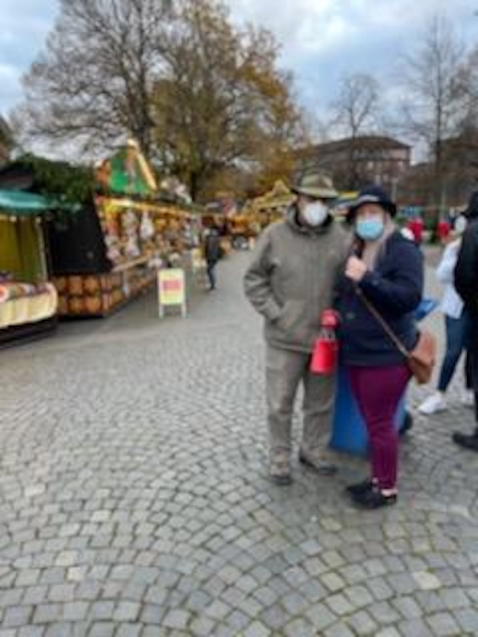 Wearing masks at the Christmas Market.  Photo my Pam Cottrel