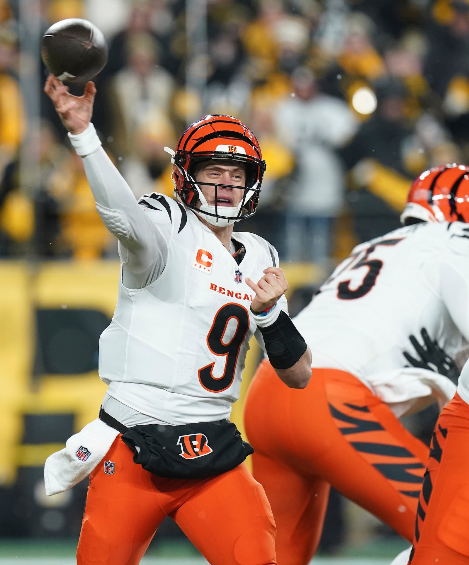 Cincinnati Bengals quarterback Joe Burrow (9) throws a pass during the first half of an NFL football against the Pittsburgh Steelers game in Pittsburgh, Saturday, Jan. 4, 2025. (AP Photo/Matt Freed)