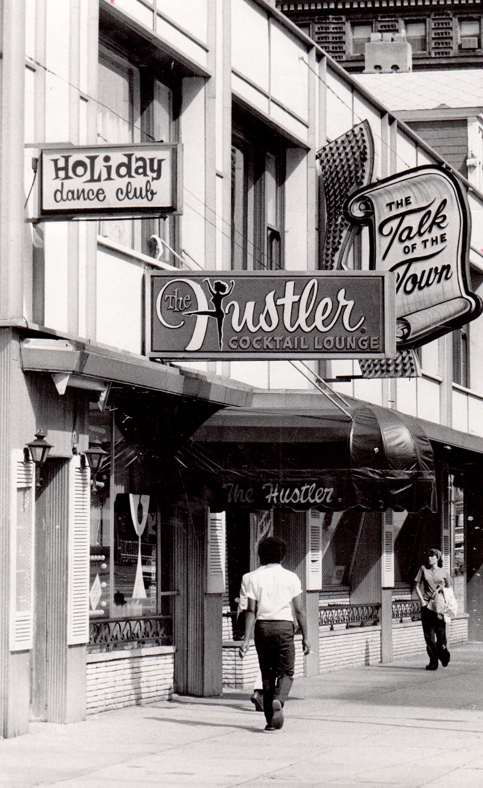 The Hustler Cocktail Lounge, 435 E. Third St. in Dayton. Photographed in August 1973. DAYTON DAILY NEWS ARCHIVE