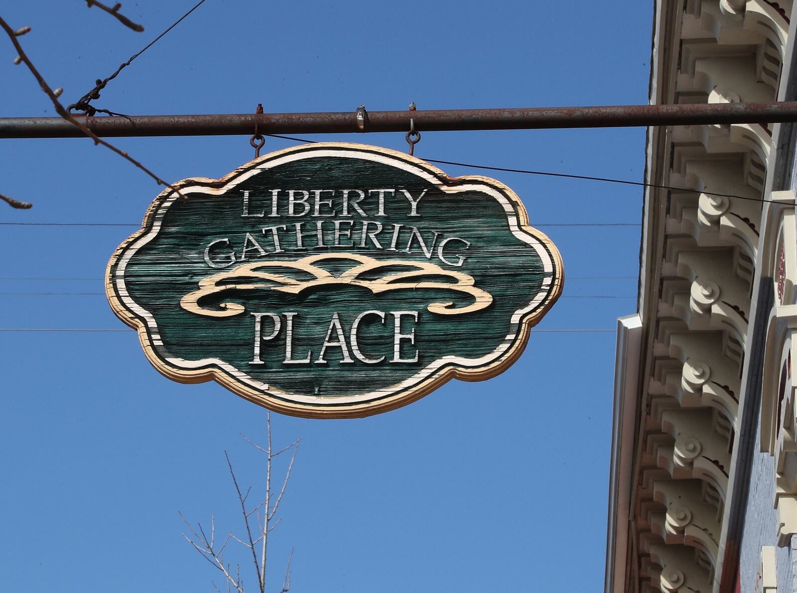 The sign in front of the Liberty Gathering Place. BILL LACKEY/STAFF