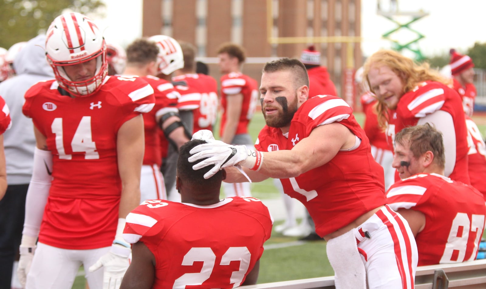 Wittenberg’s Jeff Tiffner celebrates a touchdown by Jaheem Washington by acting as if he’s giving Washington a haircut during a game against DePauw on Saturday, Oct. 20, 2018, at Edwards-Maurer Field in Springfield.