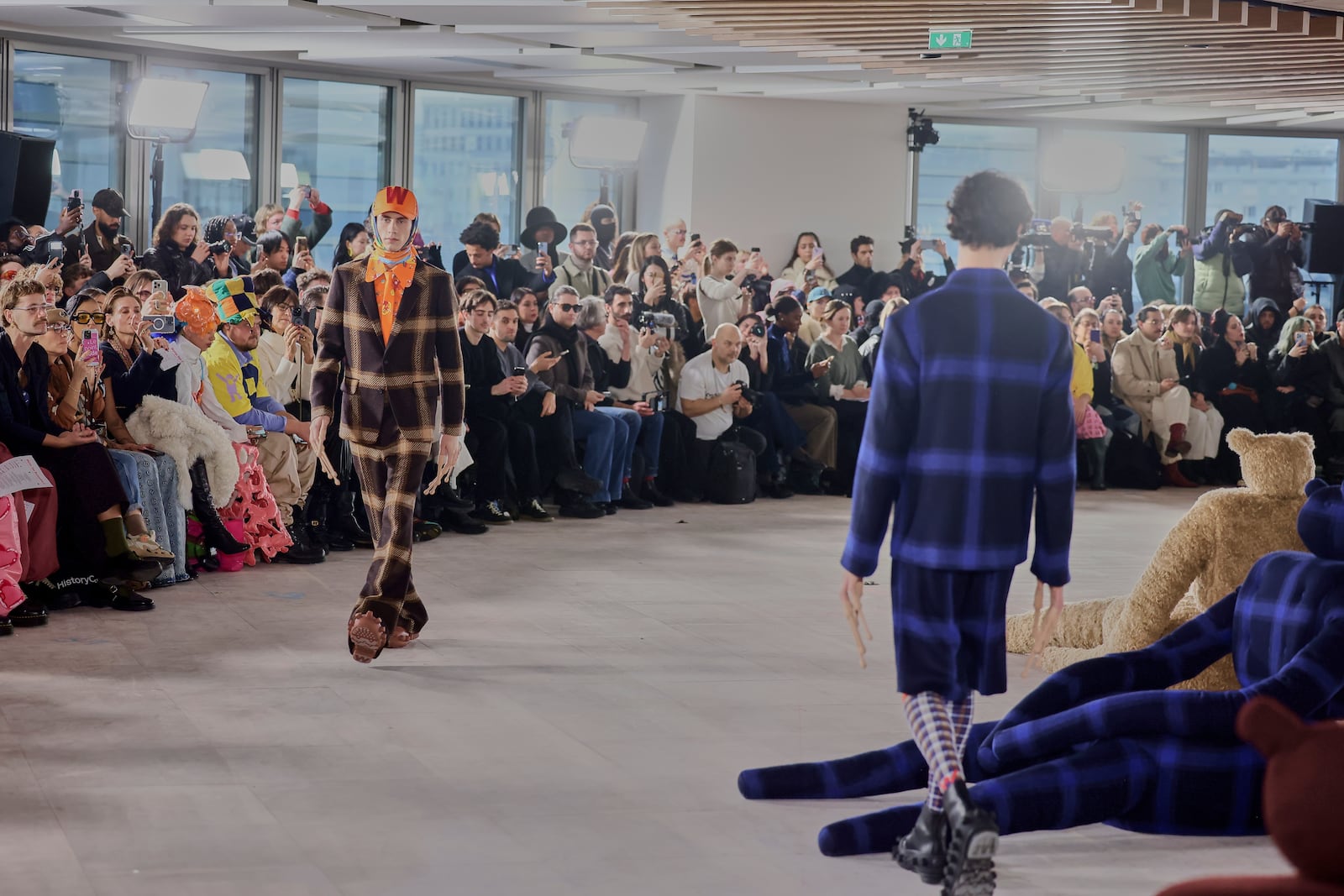 A model wears a creation as part of the men's Walter van Beirendonck Fall-Winter 2025-2026 collection, that was presented in Paris, Wednesday, Jan. 22, 2025. (AP Photo/Thomas Padilla).