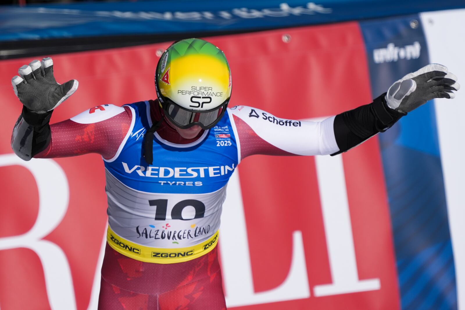 Austria's Raphael Haaser celebrates at the finish area of a men's Super-G, at the Alpine Ski World Championships, in Saalbach-Hinterglemm, Austria, Friday, Feb. 7, 2025. (AP Photo/Giovanni Auletta)