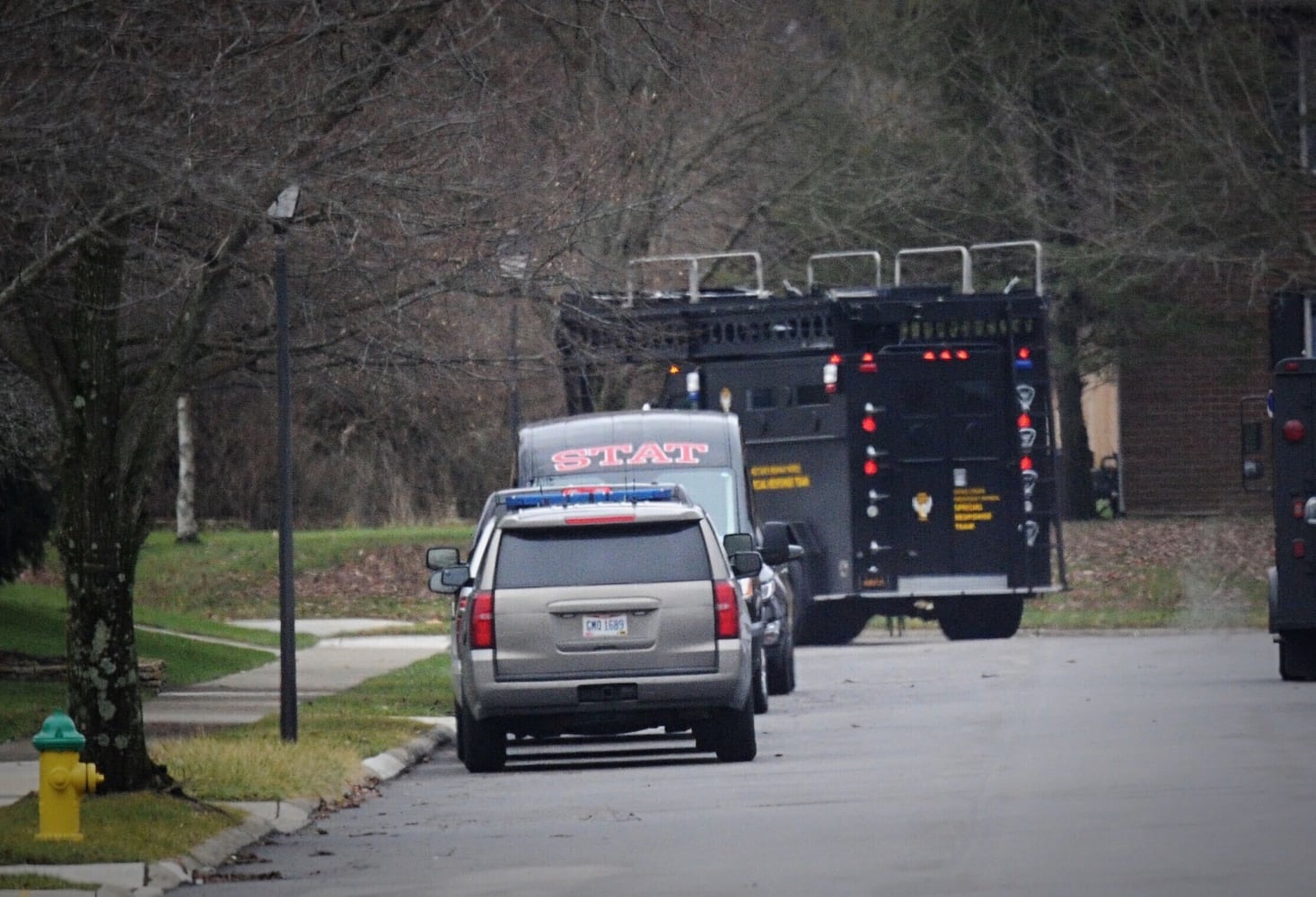 PHOTOS: Neighborhood blocked off after reported shots fired in Springfield