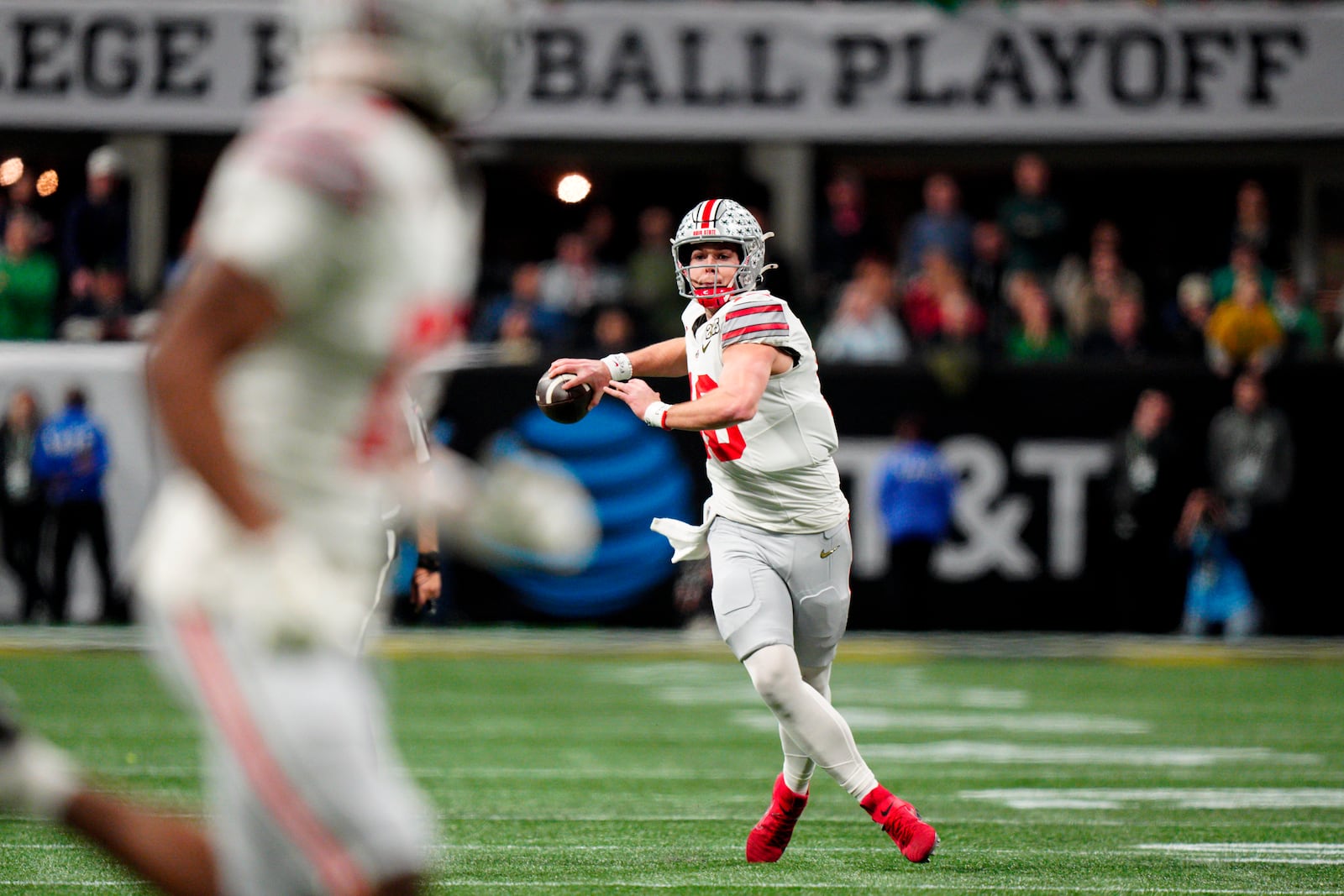 Ohio State quarterback Will Howard passes against Notre Dame during first half of the College Football Playoff national championship game Monday, Jan. 20, 2025, in Atlanta. (AP Photo/Jacob Kupferman)