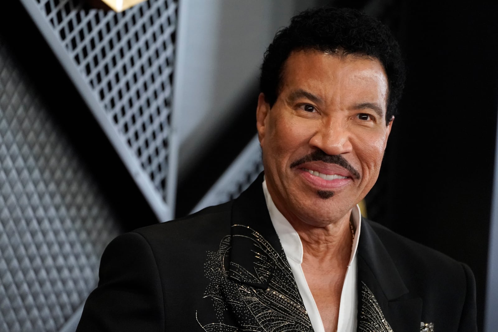 Lionel Richie arrives at the 66th annual Grammy Awards on Sunday, Feb. 4, 2024, in Los Angeles. (Photo by Jordan Strauss/Invision/AP)