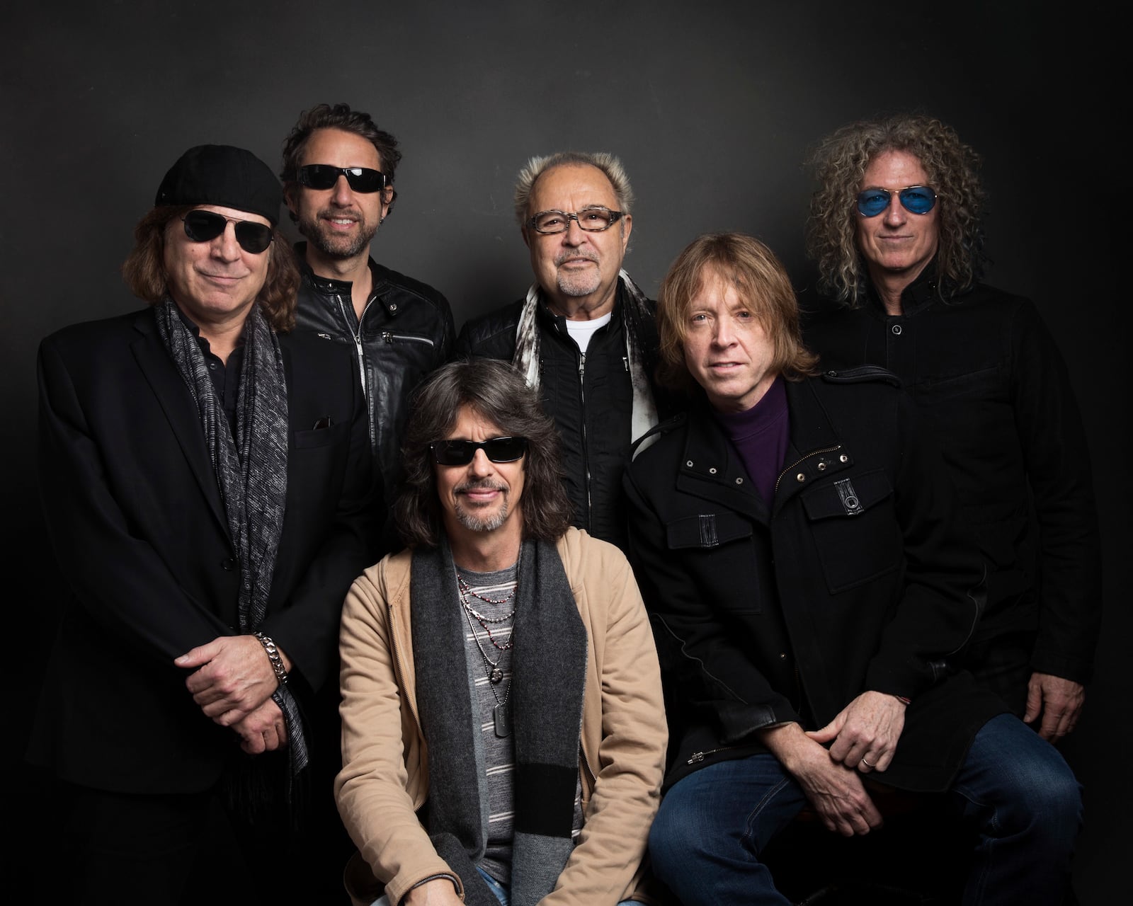 FILE - Thom Gimbel, from left, Michael Bluestein, Mick Jones, Kelly Hansen, Jeff Pilson and Bruce Watson of Foreigner pose for a portrait during the Sundance Film Festival in Park City, Utah on Jan. 20, 2017. (Photo by Taylor Jewell/Invision/AP, File)