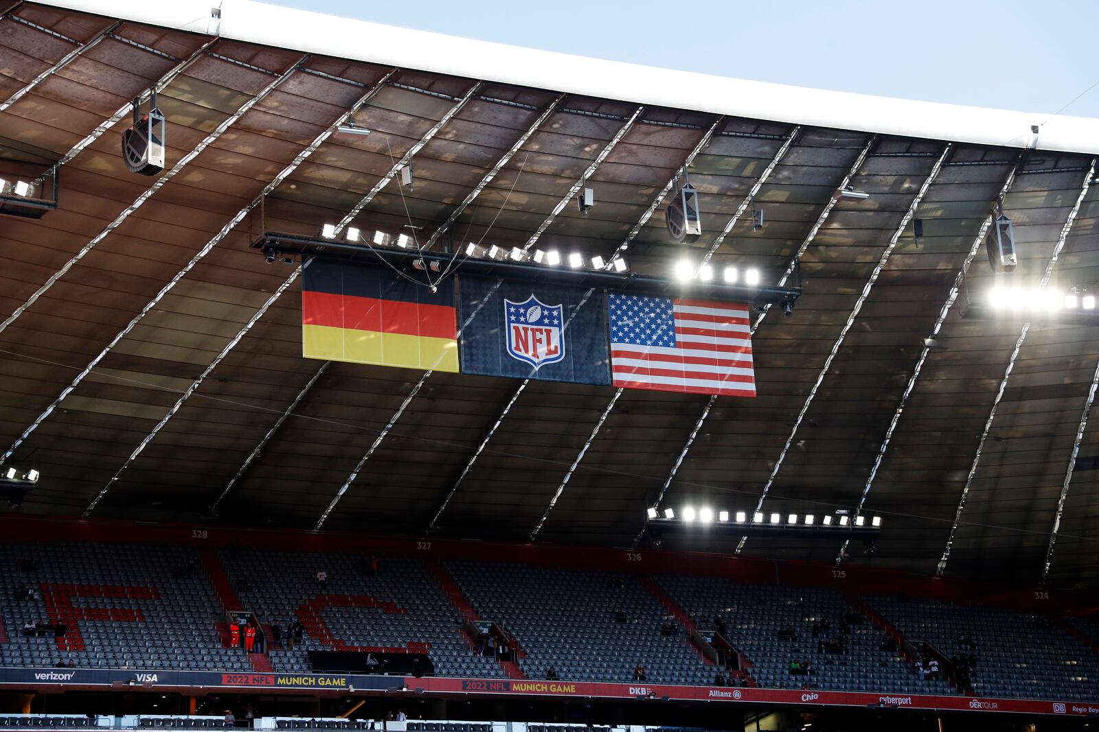 FILE - The German, NFL, and United States flags are displayed in the stadium before an NFL football game between the Tampa Bay Buccaneers and the Seattle Seahawks at Allianz Arena in Munich, Germany, Sunday, Nov. 13, 2022. (AP Photo/Steve Luciano, File)