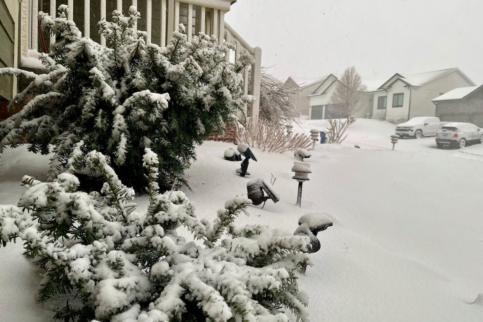 The streets are covered with snow after a storm on Wednesday, March 19, 2025 in Omaha, Neb. (AP Photo/Margery Beck)