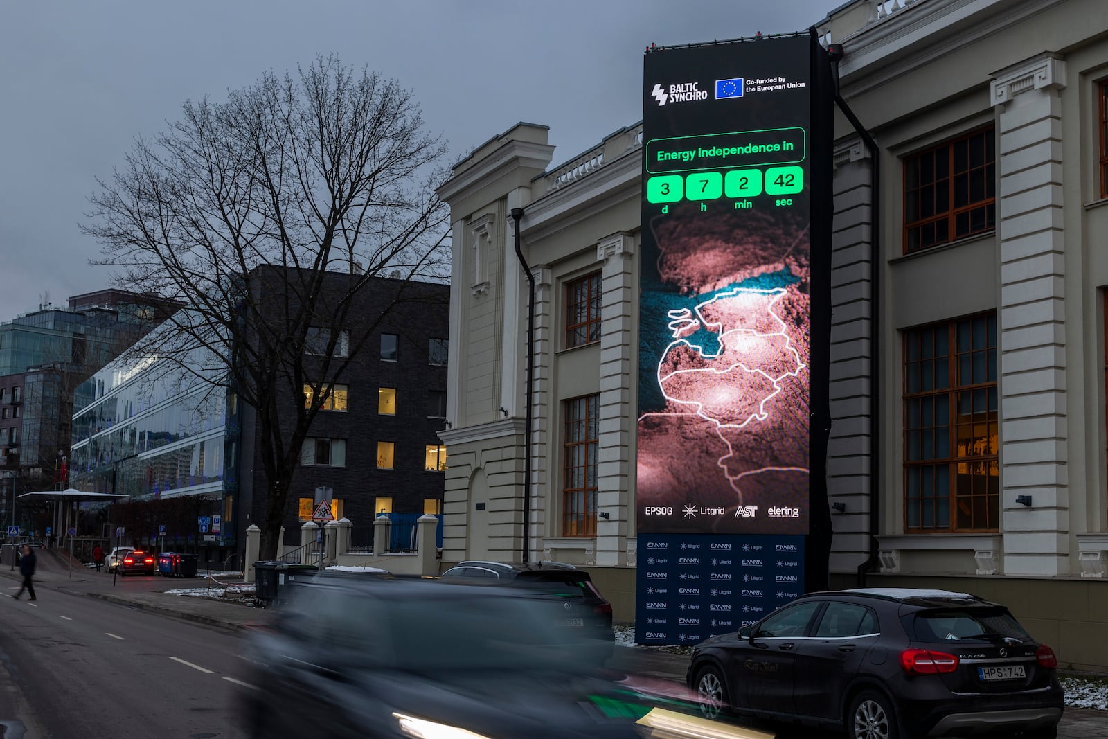 A screen near the Energy Museum and Mindaugas Bridge indicates that on February 8 the Baltic States will disconnect from the Russian electricity grid to synchronise with Continental Europe, in Vilnius, Lithuania, Tuesday, Feb. 4, 2025. (AP Photo/Mindaugas Kulbis)