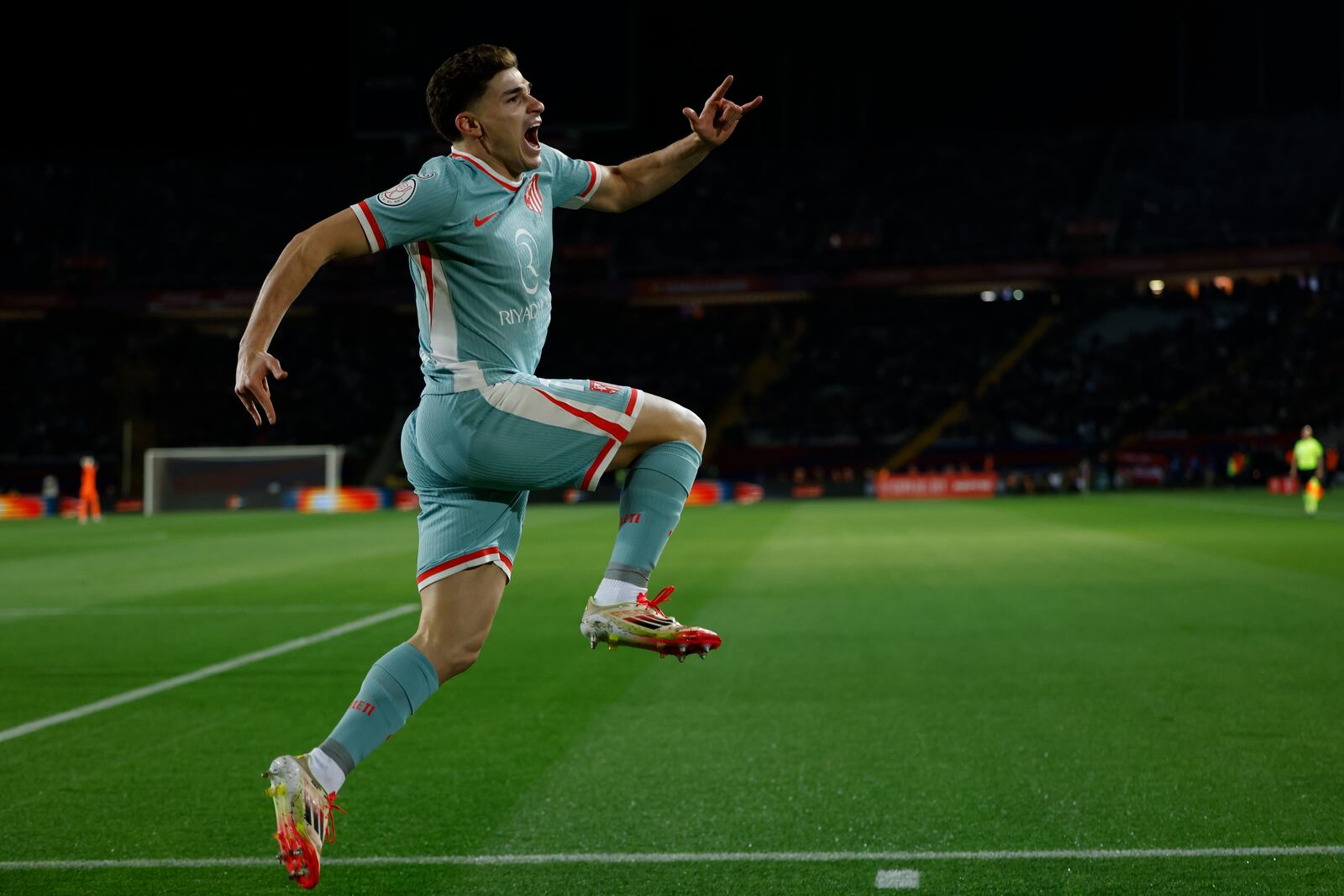 Atletico Madrid's Julian Alvarez celebrates after scoring during a Spanish Copa del Rey, or King's Cup, the semi-final soccer match between Barcelona and Atletico Madrid in Barcelona, Spain, Tuesday, Feb. 25, 2025. AP Photo/Joan Monfort)