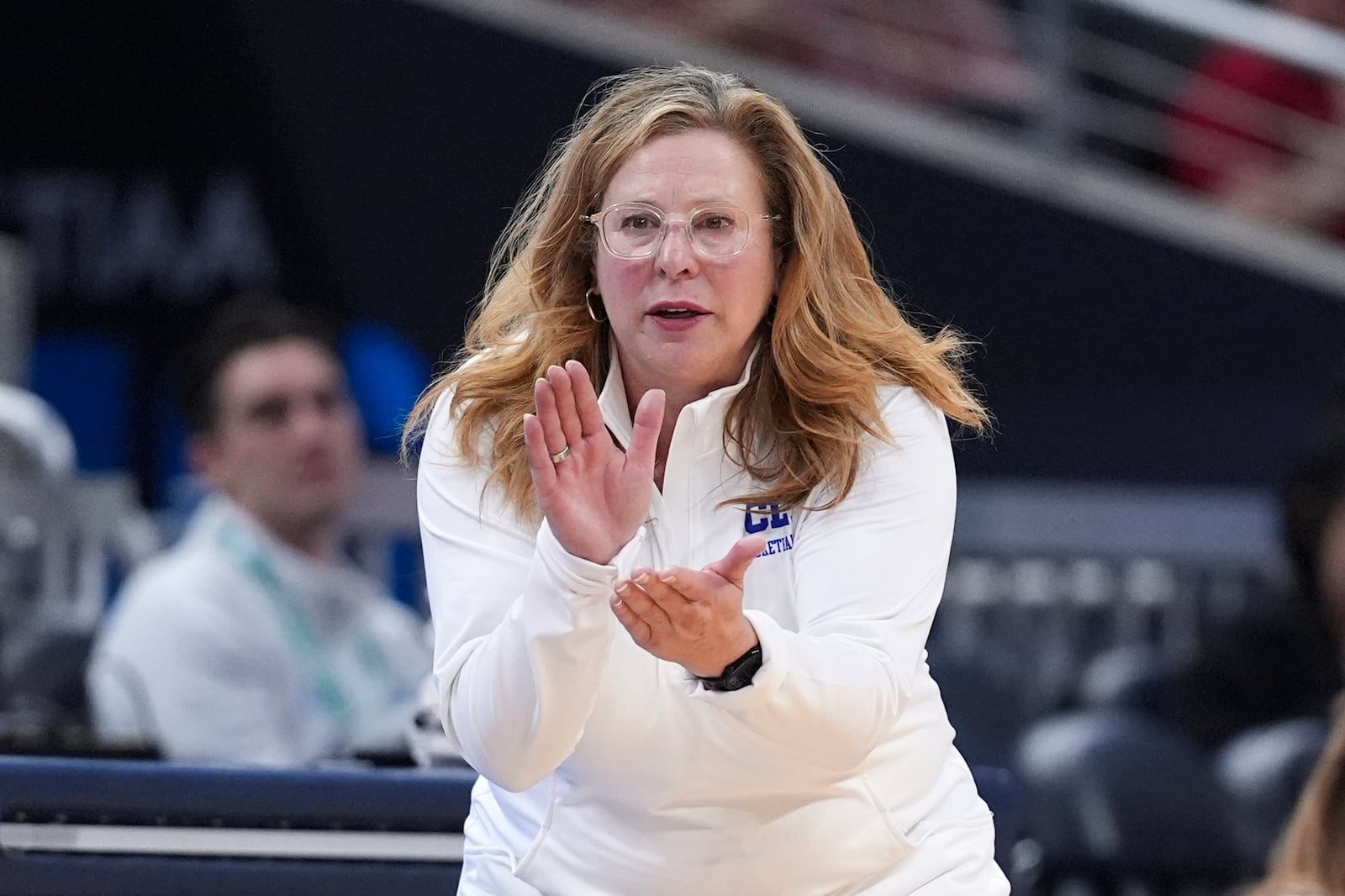 UCLA head coach Cori Close watches against Ohio State during the second half of an NCAA college basketball game in the semifinals of the Big Ten Conference tournament in Indianapolis, Saturday, March 8, 2025. (AP Photo/Michael Conroy)