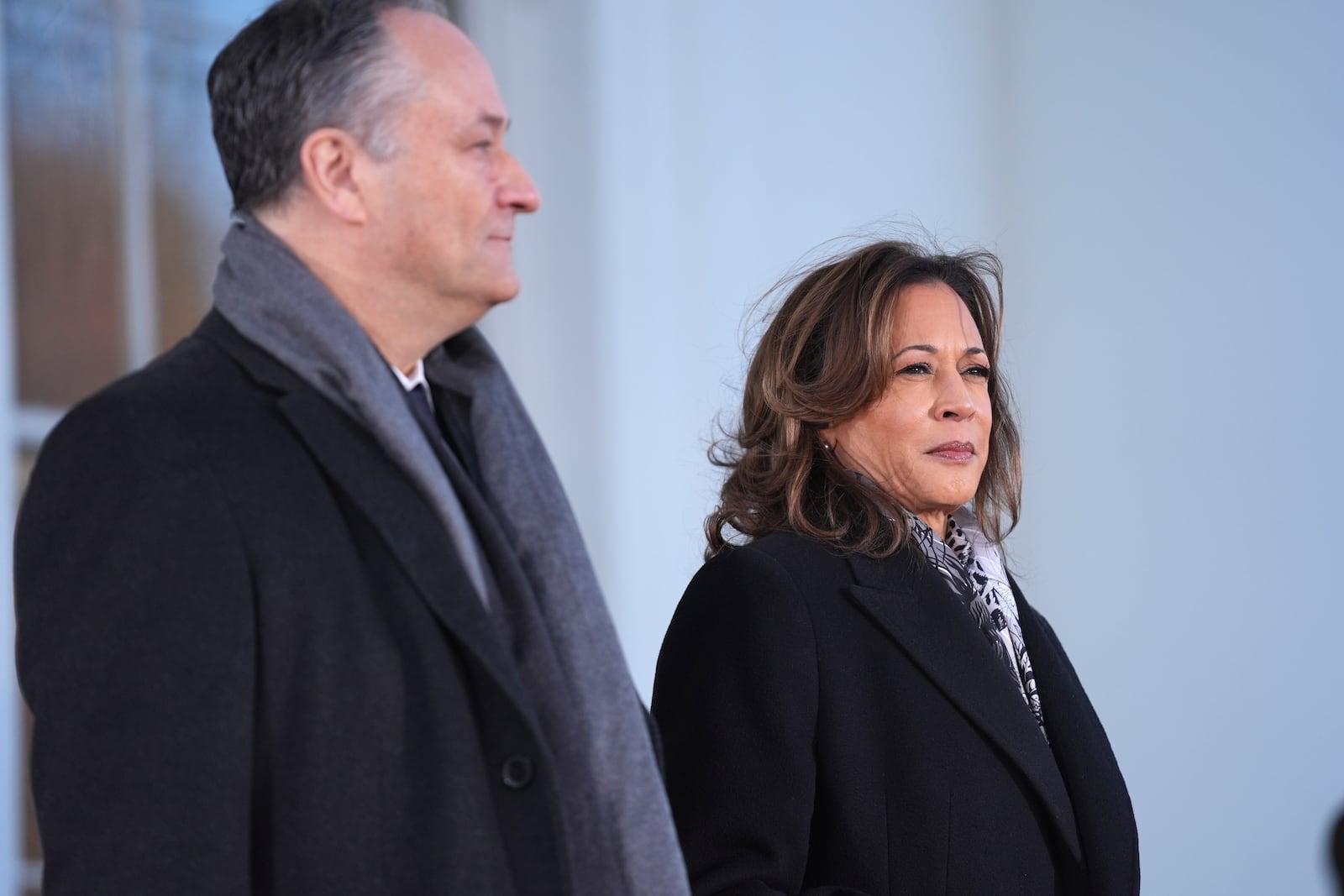 Vice President Kamala Harris, right, and second gentleman Doug Emhoff stand before greeting Vice President-elect JD Vance and Usha Vance at the White House, Monday, Jan. 20, 2025, in Washington. (AP Photo/Evan Vucci)