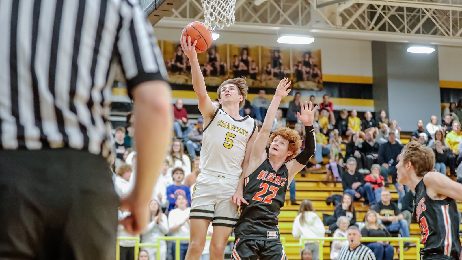 Shawnee High School senior Cody Siemon shoots the ball over North Union junior Tyler Krebehenne during their game on Friday, Feb. 2 in Springfield. Michael Cooper/CONTRIBUTED