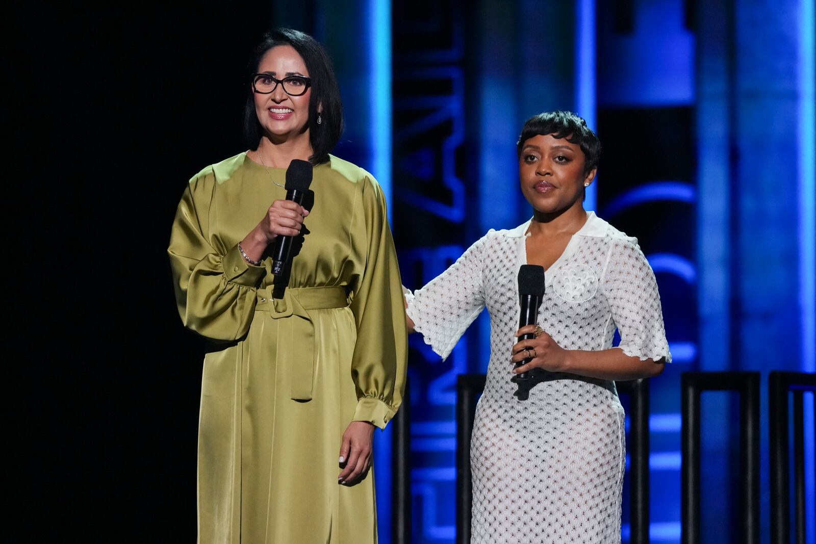 Aurora Barboza Flores, left, and Quinta Brunson speak during the FireAid benefit concert on Thursday, Jan. 30, 2025, at Intuit Dome in Inglewood, Calif. (Photo by Jordan Strauss/Invision/AP)