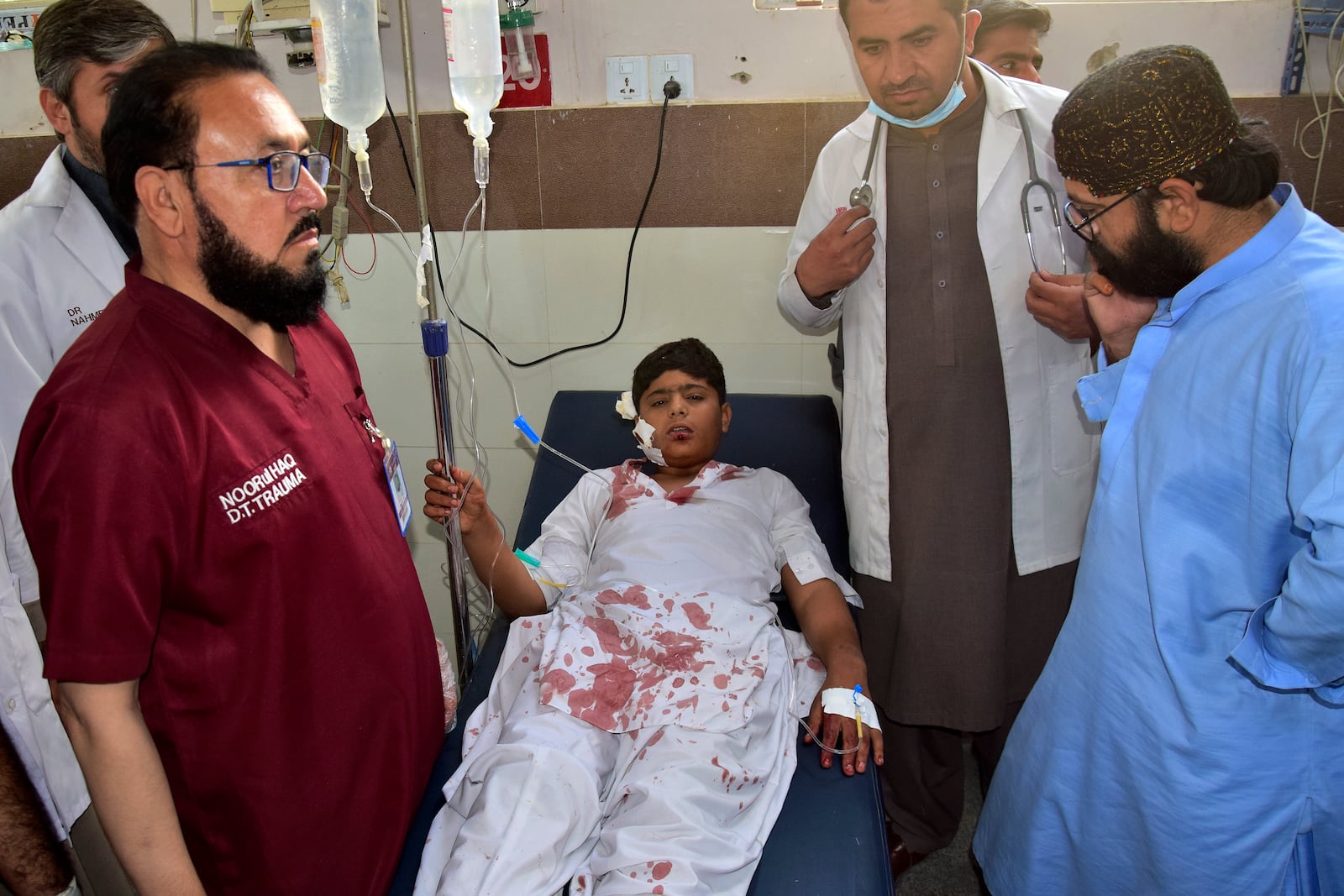 A boy, who was injured in the bomb explosion in Mastung town, is treated at a hospital in Quetta, Pakistan, Friday, Nov. 1, 2024. (AP Photo/Arshad Butt)