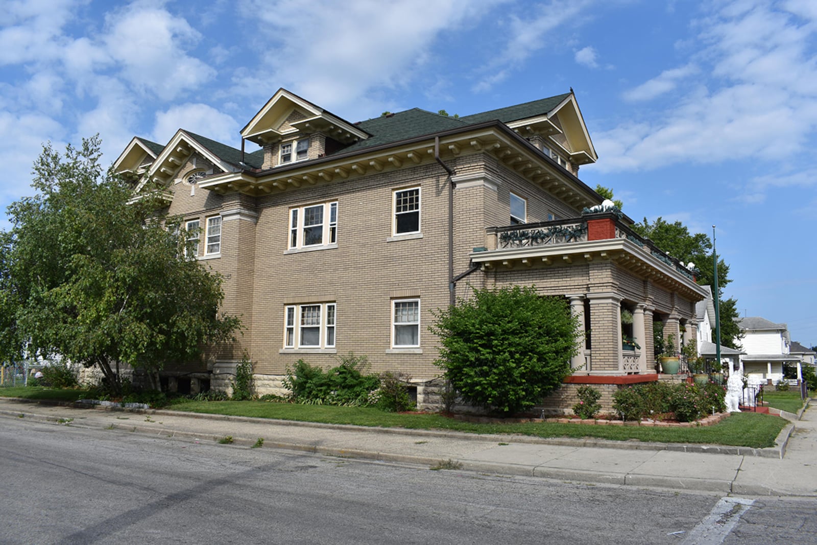 An original solid-wood staircase leads to the second and third floors and 10 bedrooms, all of which have original woodwork and hardwood floors, some with carpet covering the wood. The largest bedroom has a private porch that runs the length of the front of the home. CONTRIBUTED PHOTO