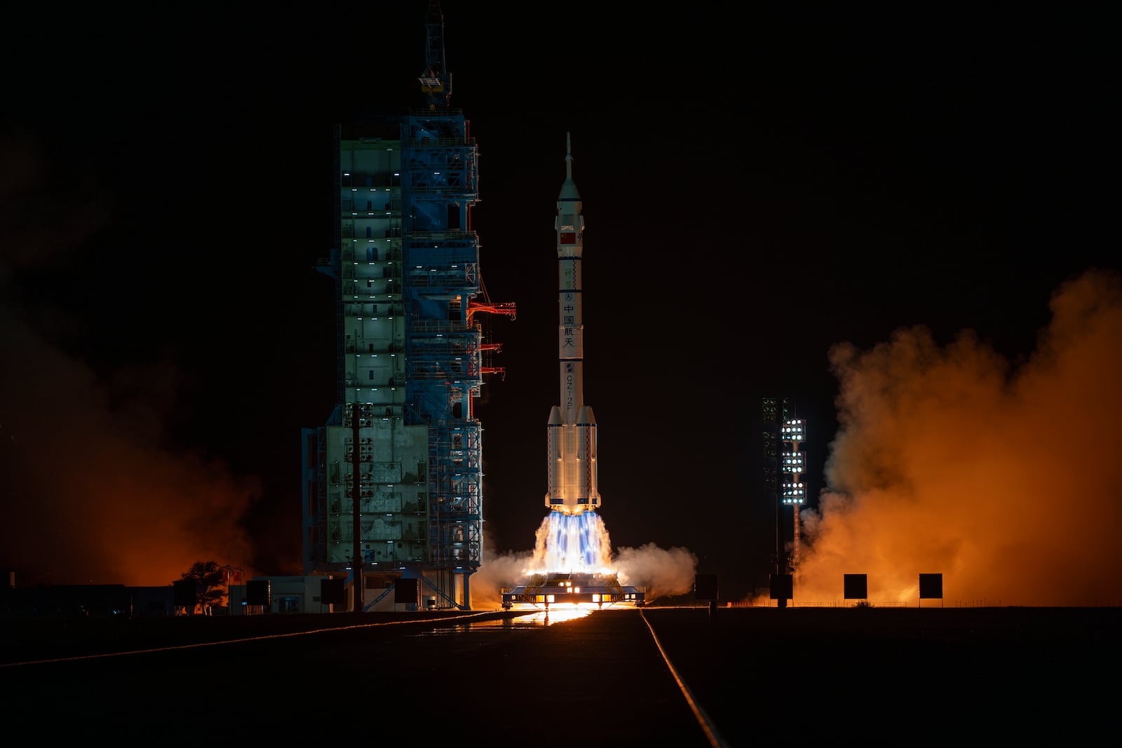 Shenzhou-19 spacecraft atop a Long March rocket takes off from the Jiuquan Satellite Launch Center in northwestern China in the early hours of Wednesday, Oct. 30, 2024. (AP Photo/Ng Han Guan)