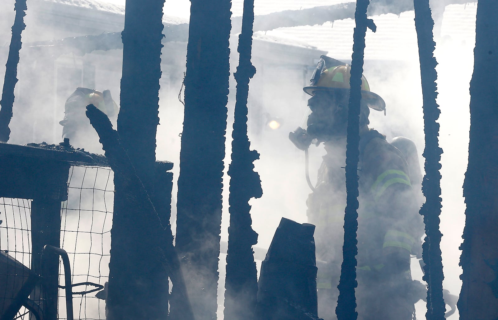 The Springfield Fire Rescue Division battled a house fire at a residence in the 900 block of Emery Street Monday, Feb. 19, 2024. The fire appeared to start in an attached garages and quickly spread to the two story residence. Fire crews arrived to find flames and smoke billowing from the garage and rear of the house. Two residents were home at the time of the fire and were uninjured. The cause of the fire is under investigation. BILL LACKEY/STAFF