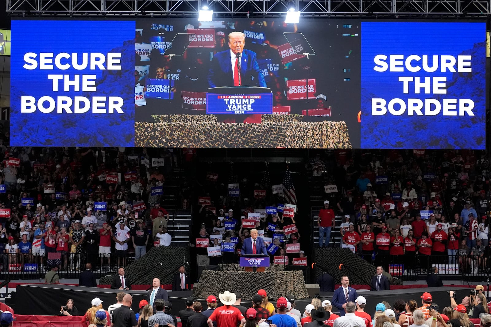 Republican presidential nominee former President Donald Trump speaks at a campaign rally at the Findlay Toyota Arena Sunday, Oct. 13, 2024, in Prescott Valley, Ariz. (AP Photo/Ross Franklin)