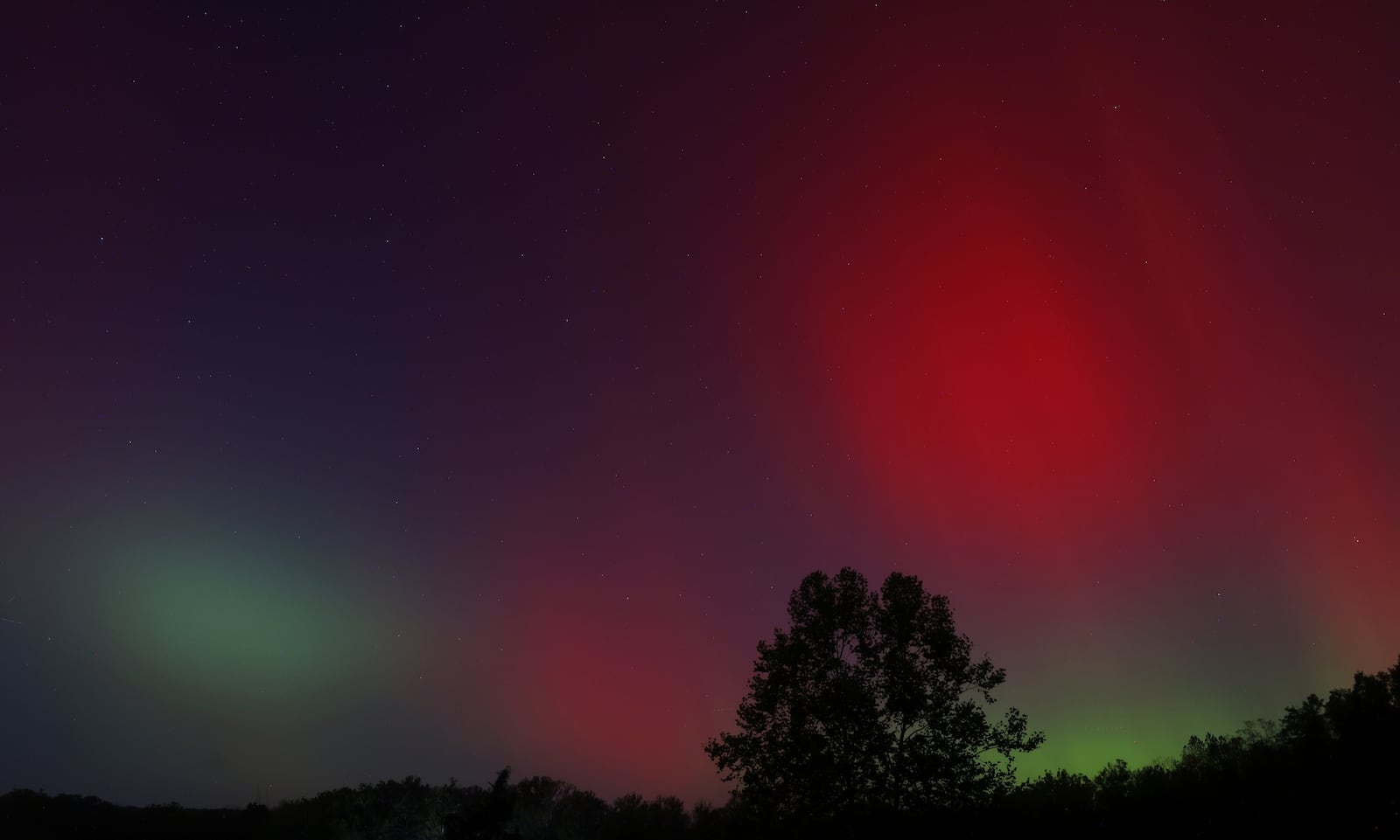 The Aurora Borealis, or northern lights, was visible from Ohio Thursday, Oct. 10, 2024. This was in Madison Township in Butler County. NICK GRAHAM/STAFF