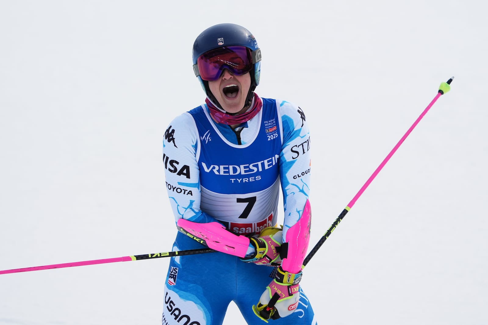 United States' Paula Moltzan celebrates winning the bronze medal in a women's giant slalom, at the Alpine Ski World Championships, in Saalbach-Hinterglemm, Austria, Thursday, Feb. 13, 2025. (AP Photo/Giovanni Auletta)