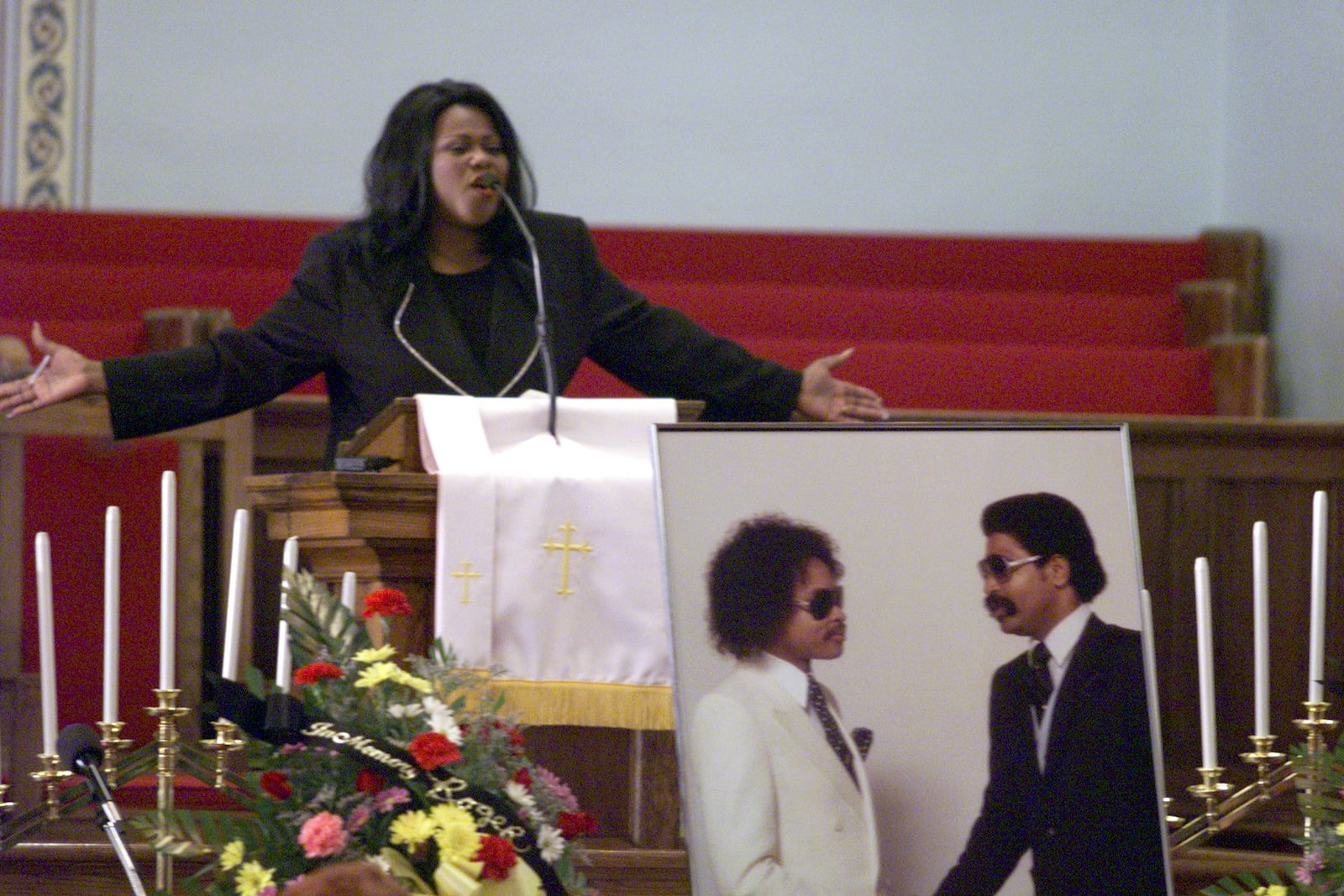 April 30, 1999---story by Franklin---Memorial Service for Roger and Larry Troutman at Shiloh Misssionary Baptist Church on Fairbanks Ave in Dayton. Shirly Murdock-DeGroat leads congregation in prayer.