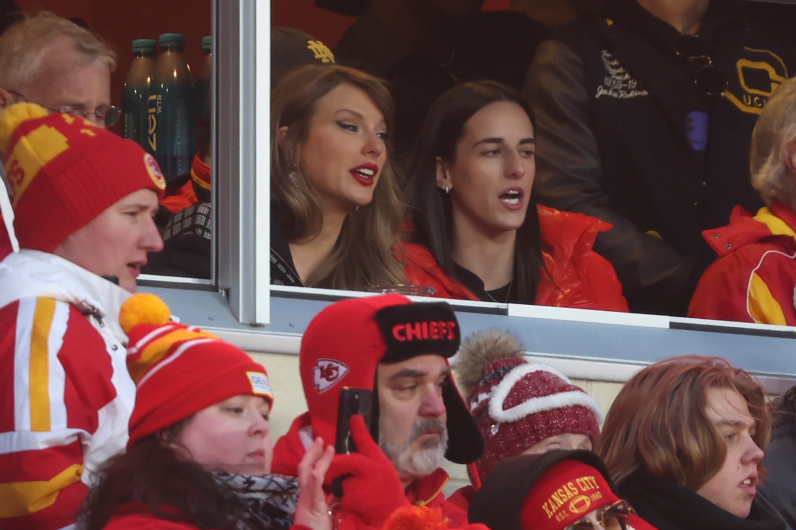 Taylor Swift watches from a suite with basketball player Caitlin Clark, right, during the second half of an NFL football AFC divisional playoff game Saturday, Jan. 18, 2025, in Kansas City, Mo. (AP Photo/Travis Heying)