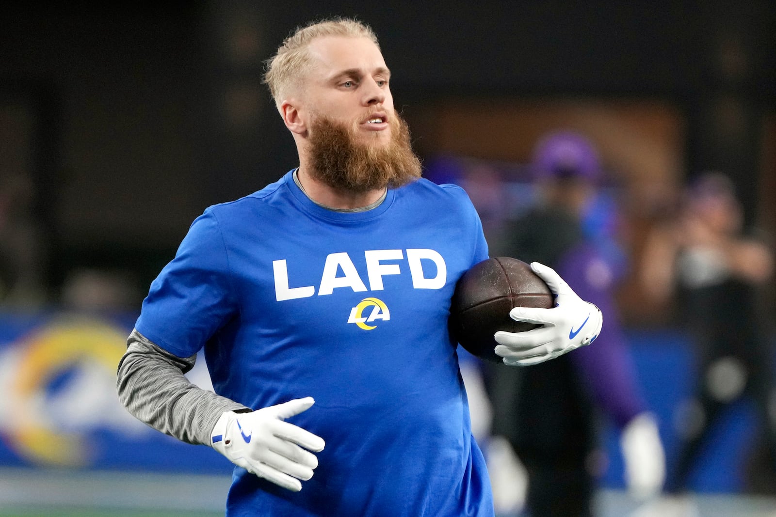 Los Angeles Rams wide receiver Cooper Kupp catches a pass before an NFL wild card playoff football game against the Minnesota Vikings, Monday, Jan. 13, 2025, in Glendale, Ariz. (AP Photo/Rick Scuteri)