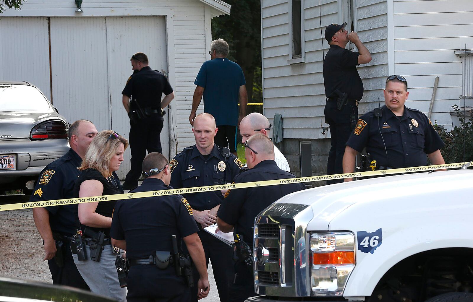 Members of the Springfield Police Division at 37 South Burnett Dr. in 2016.