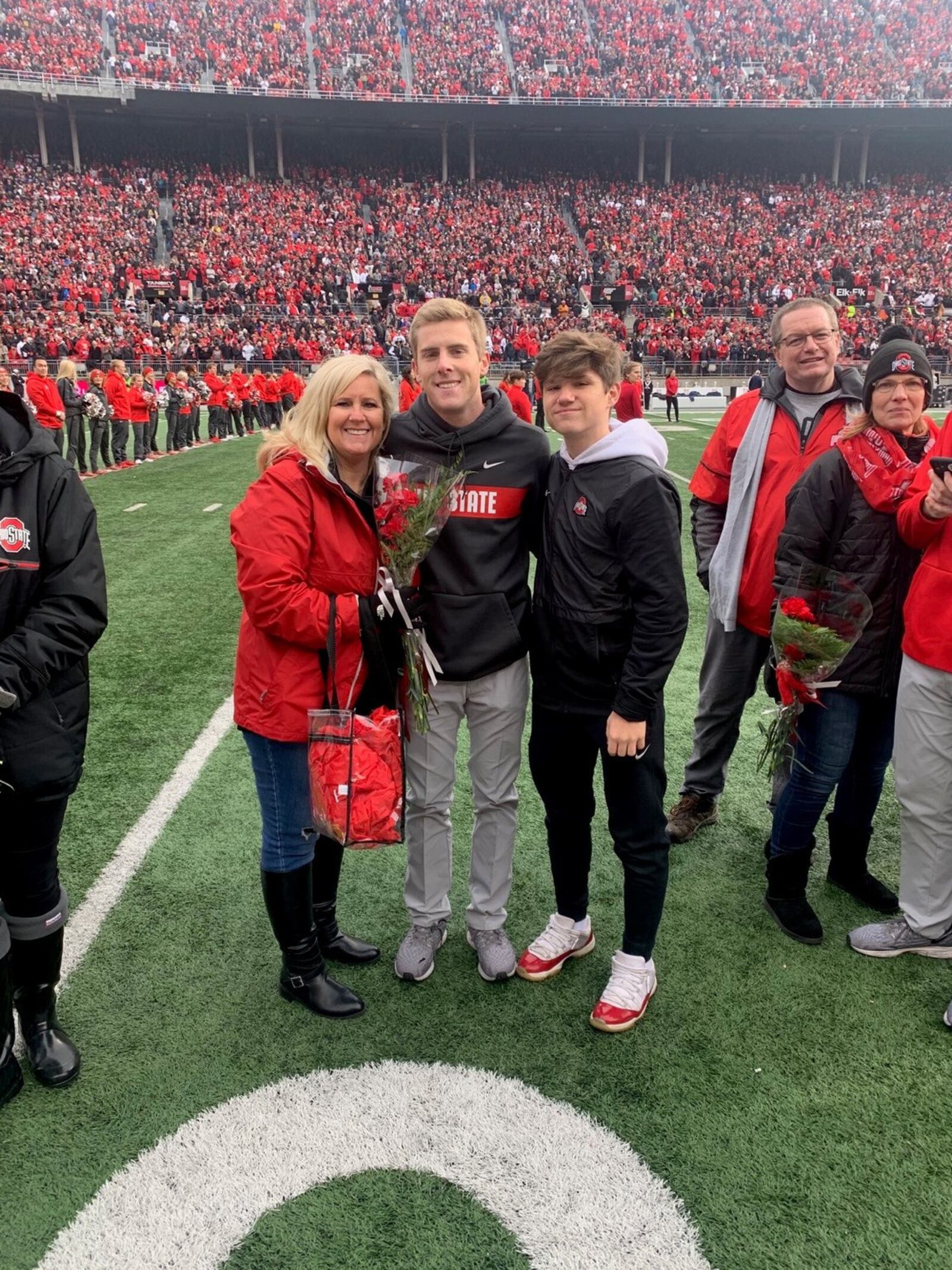 Ohio State manager Austin Edwards with mom Susanne Edwards and his brother Brayden. CONTRIBUTED