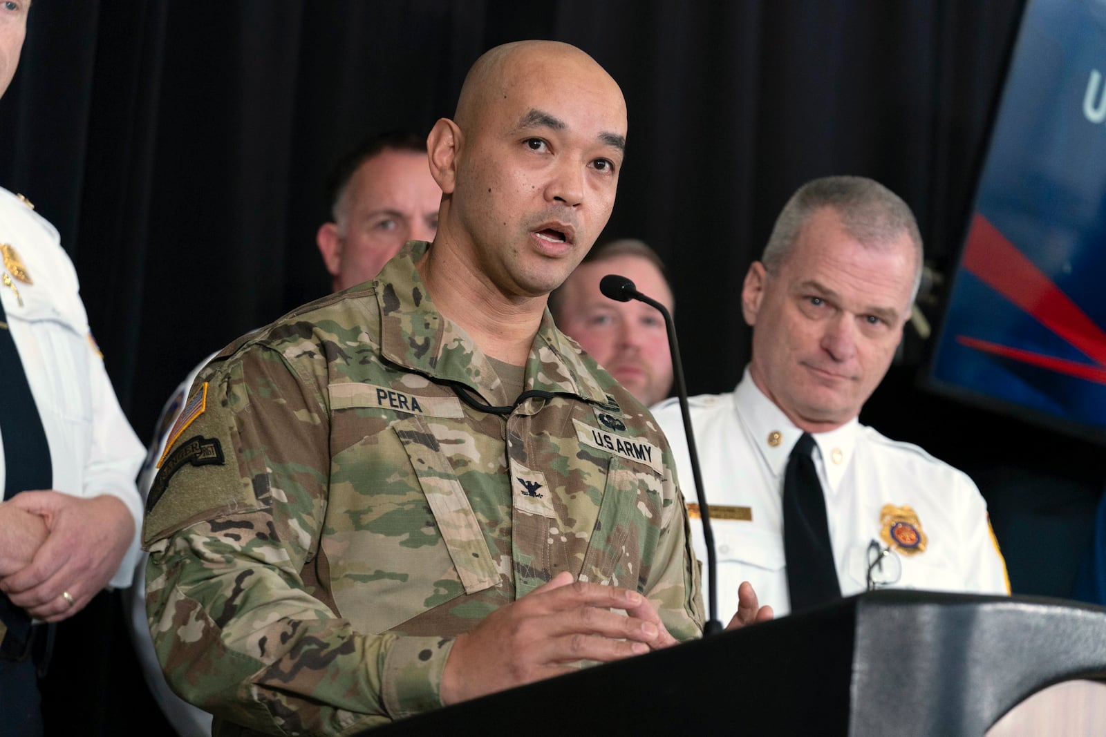 Col. Francis Pera, commander of the U.S. Army Corps of Engineers, speaks during a news conference at Ronald Reagan Washington National Airport, Sunday, Feb. 2, 2025, in Arlington, Va. (AP Photo/Jose Luis Magana)