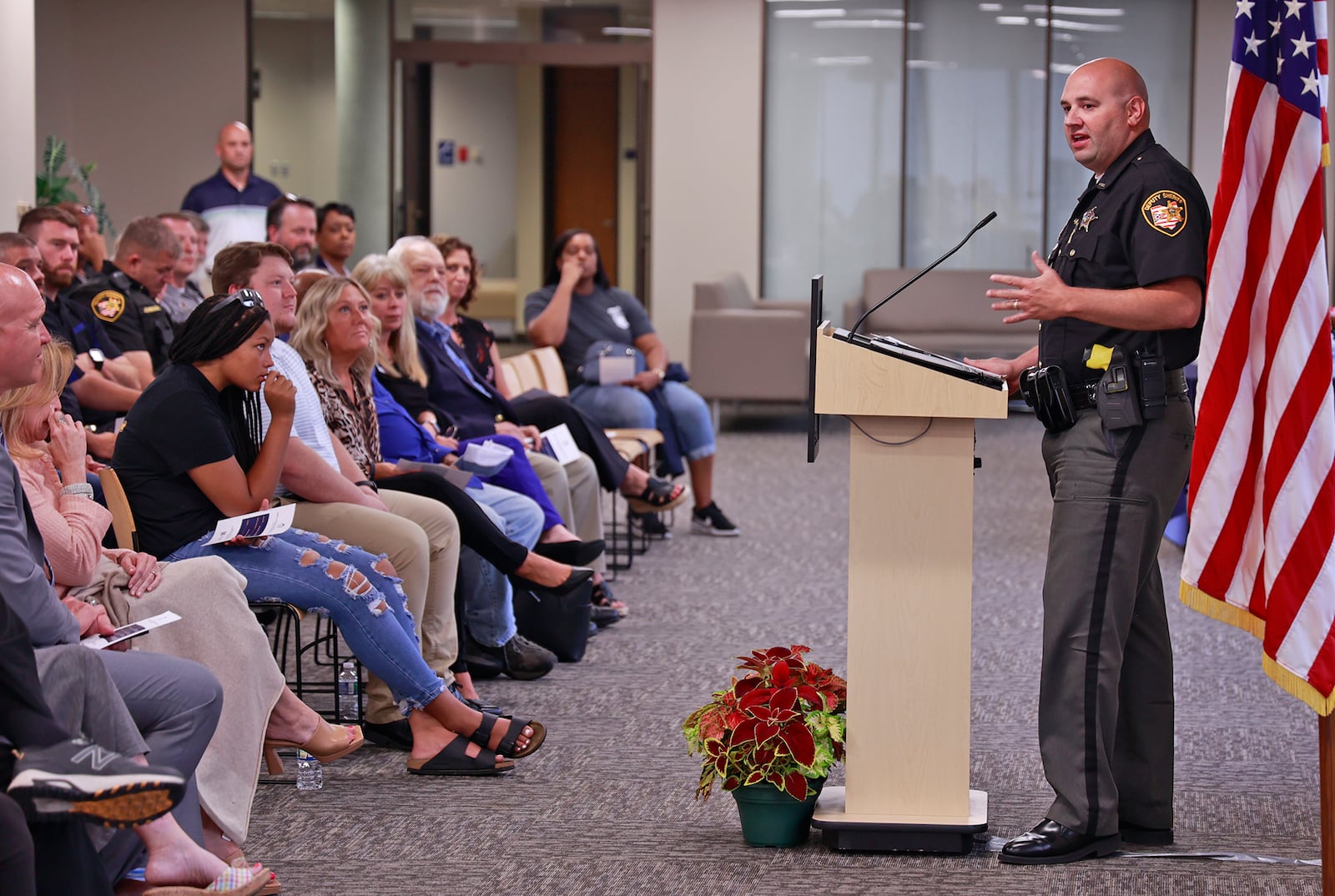 Clark County Sheriff's deputy John Loney talks about fallen deputy and friend Matthew Yates during a dedication ceremony for a room named in Yates' honor Tuesday at Clark State College's Brinkman Center Tuesday, June 20, 2023. BILL LACKEY/STAFF