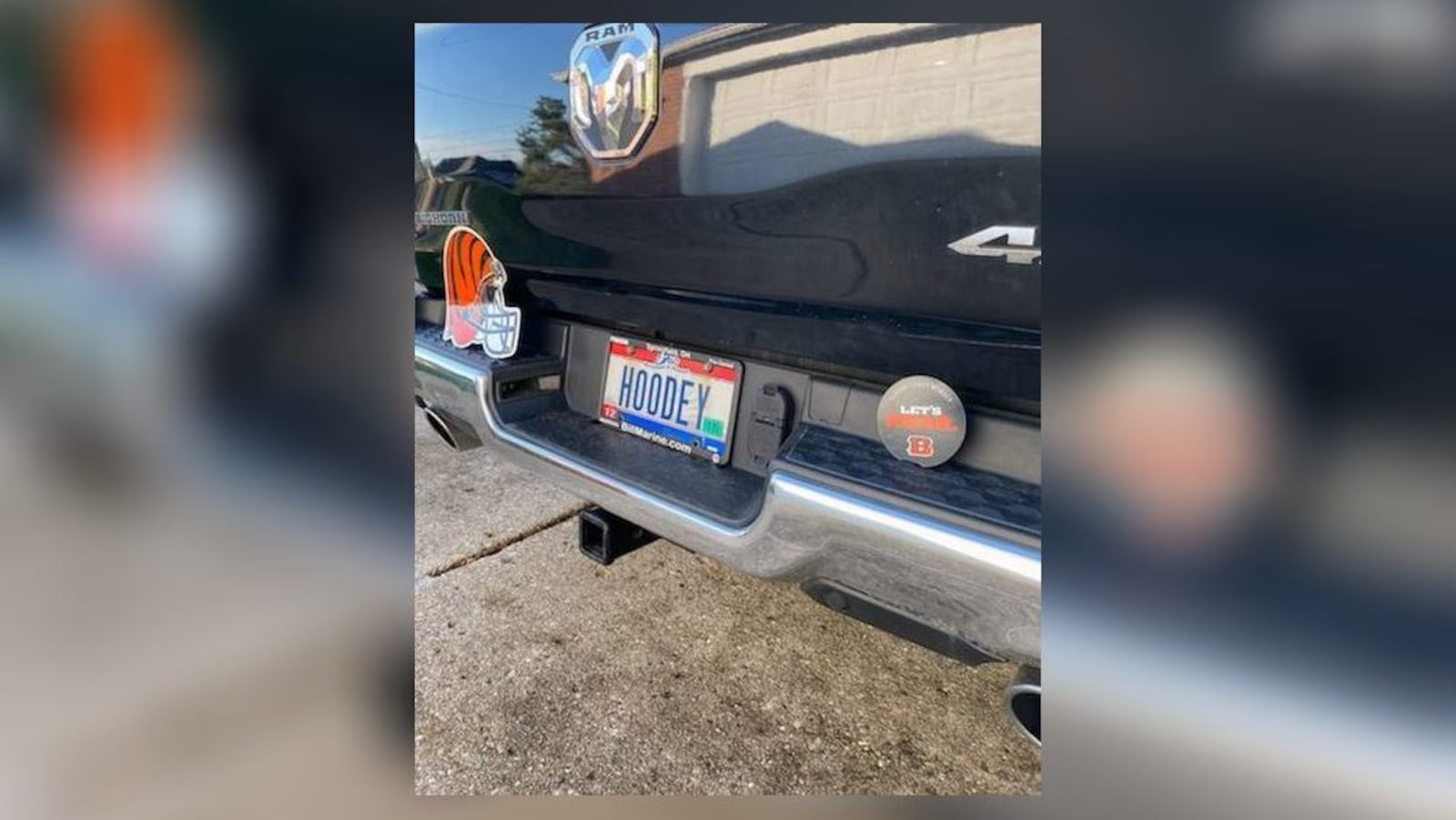 Carolyn Black's Dodge Ram that has an orange stripe on it and a license plate that says, "HOODEY". Contributed