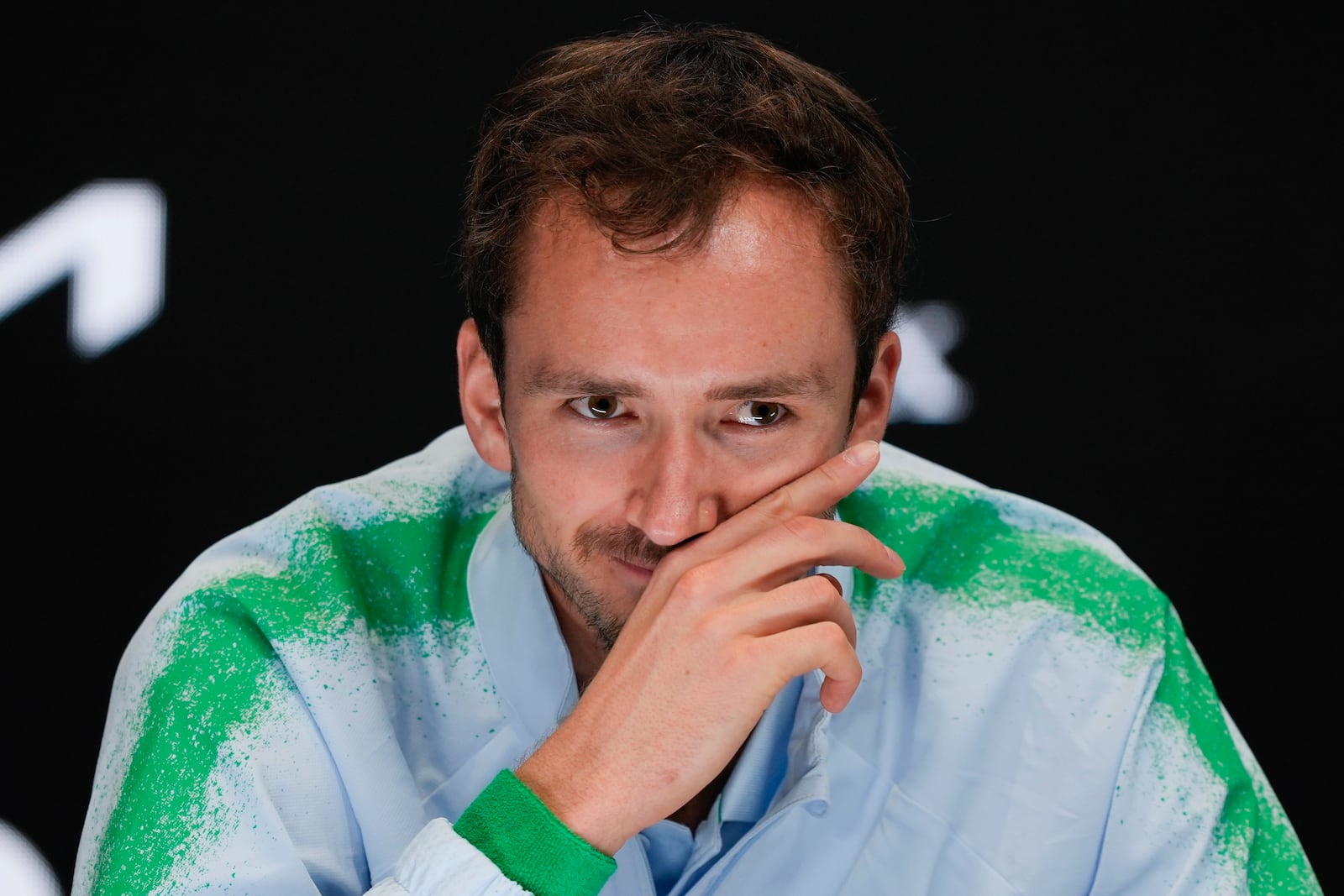 Russia's Daniil Medvedev reacts during a press conference ahead of the Australian Open tennis championship in Melbourne, Australia, Friday, Jan. 10, 2025. (AP Photo/Ng Han Guan)