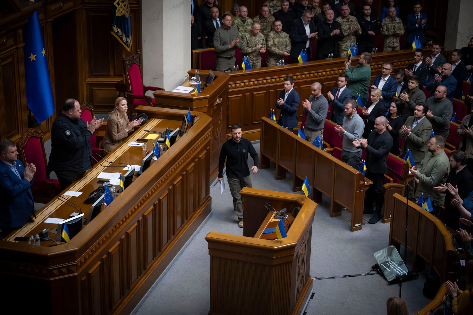 In this photo provided by the Press Service Of The President Of Ukraine on Oct. 16, 2024, Ukraine's President Volodymyr Zelenskyy arrives to speak to parliamentarians at Verkhovna Rada in Kyiv, Ukraine. (Press Service Of The President Of Ukraine via AP)